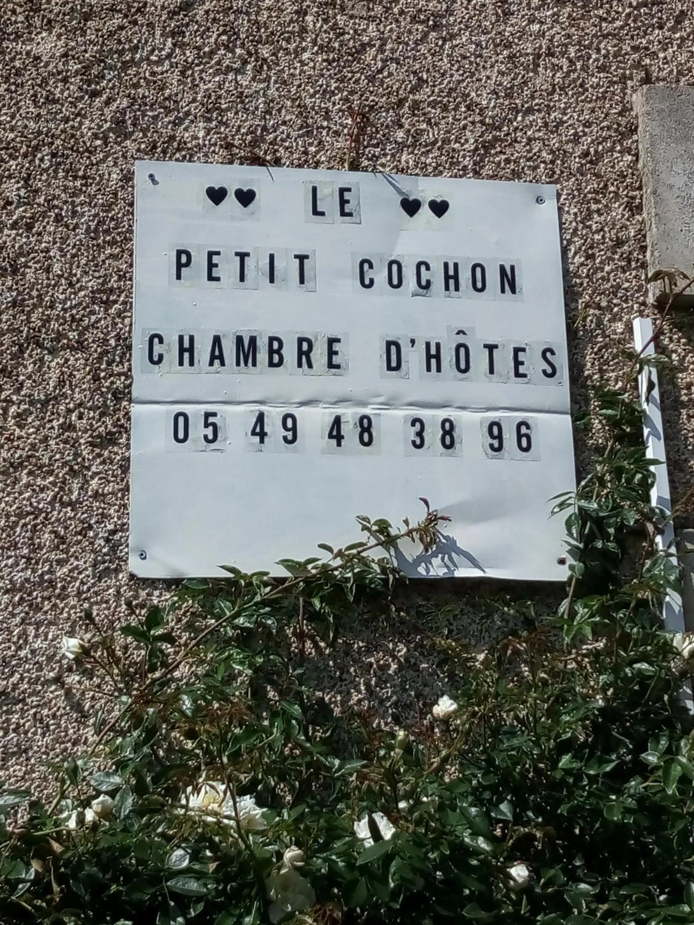 Property logo or sign in Le Petit Cochon chambre d` hotes