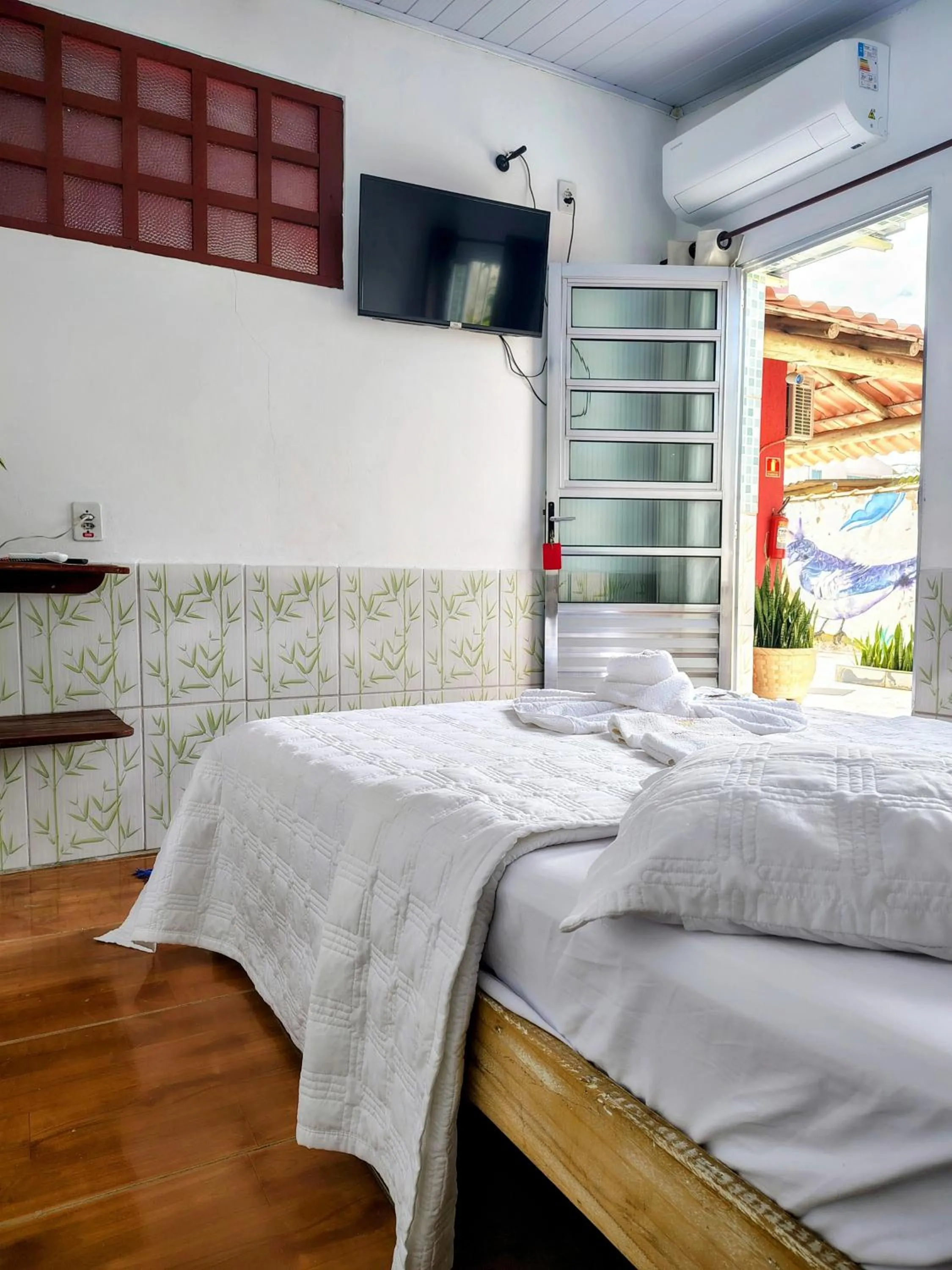 Bed in Pousada Aconchego Recanto Do Mar