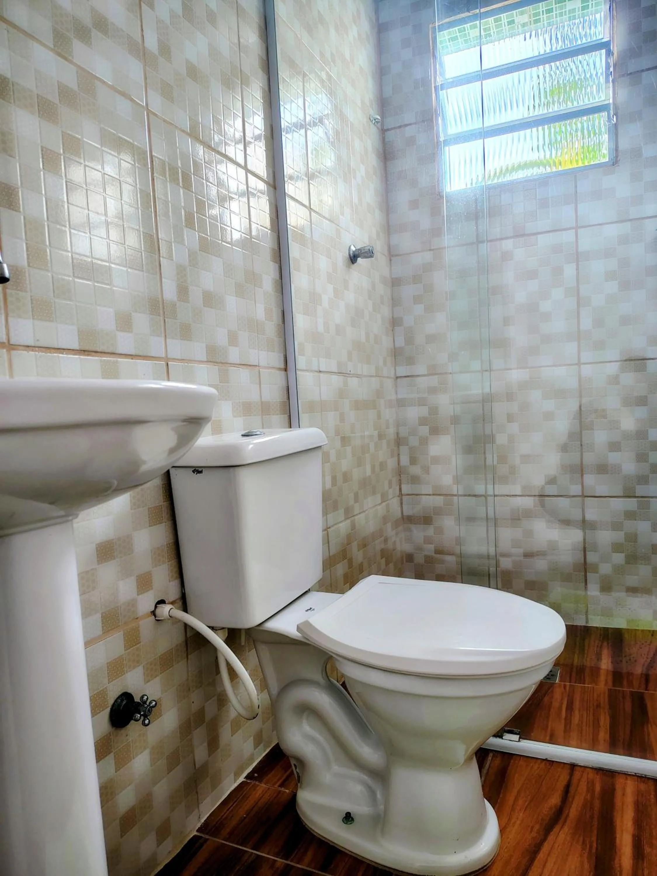 Toilet in Pousada Aconchego Recanto Do Mar