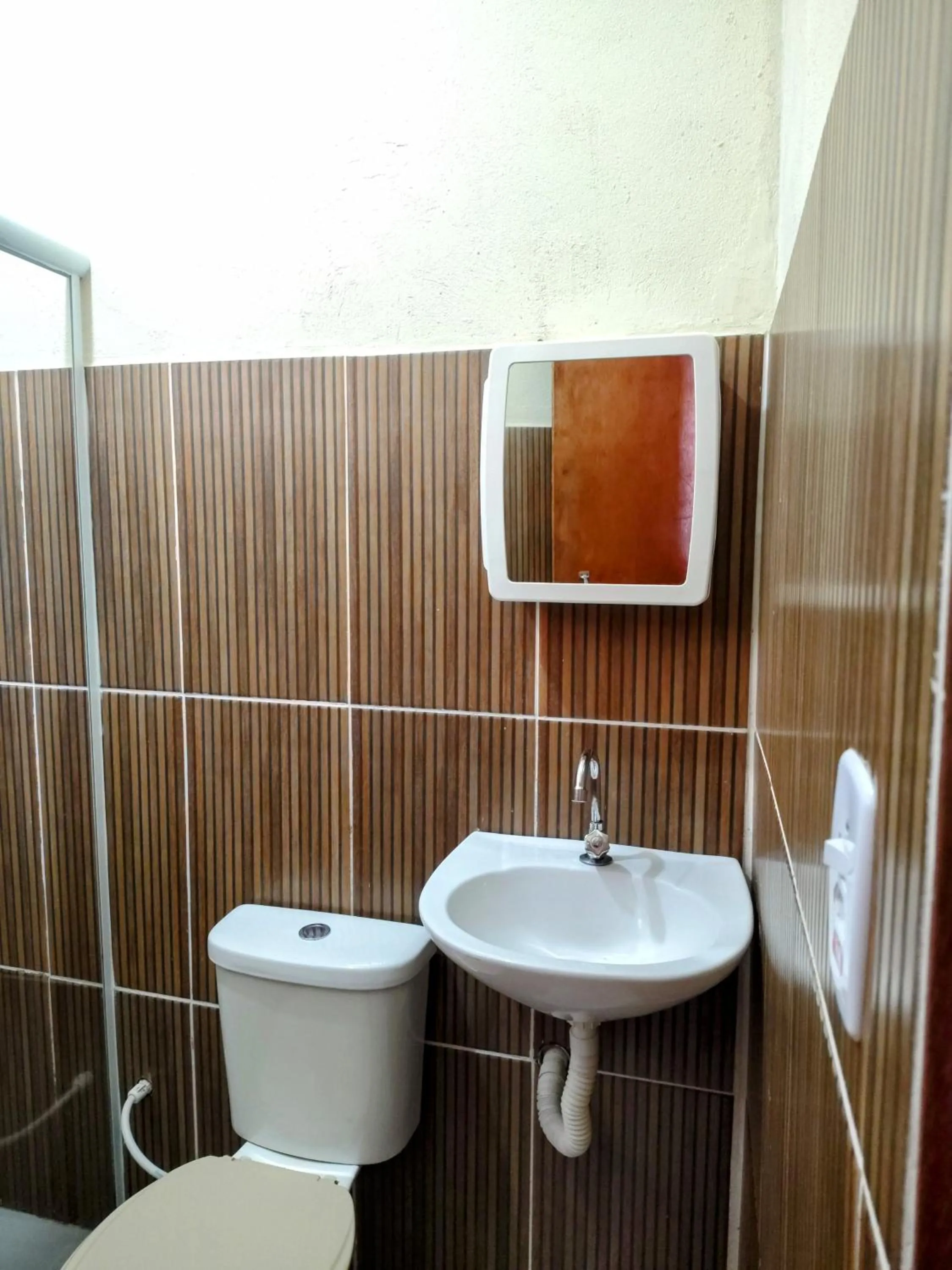 Toilet in Pousada Aconchego Recanto Do Mar