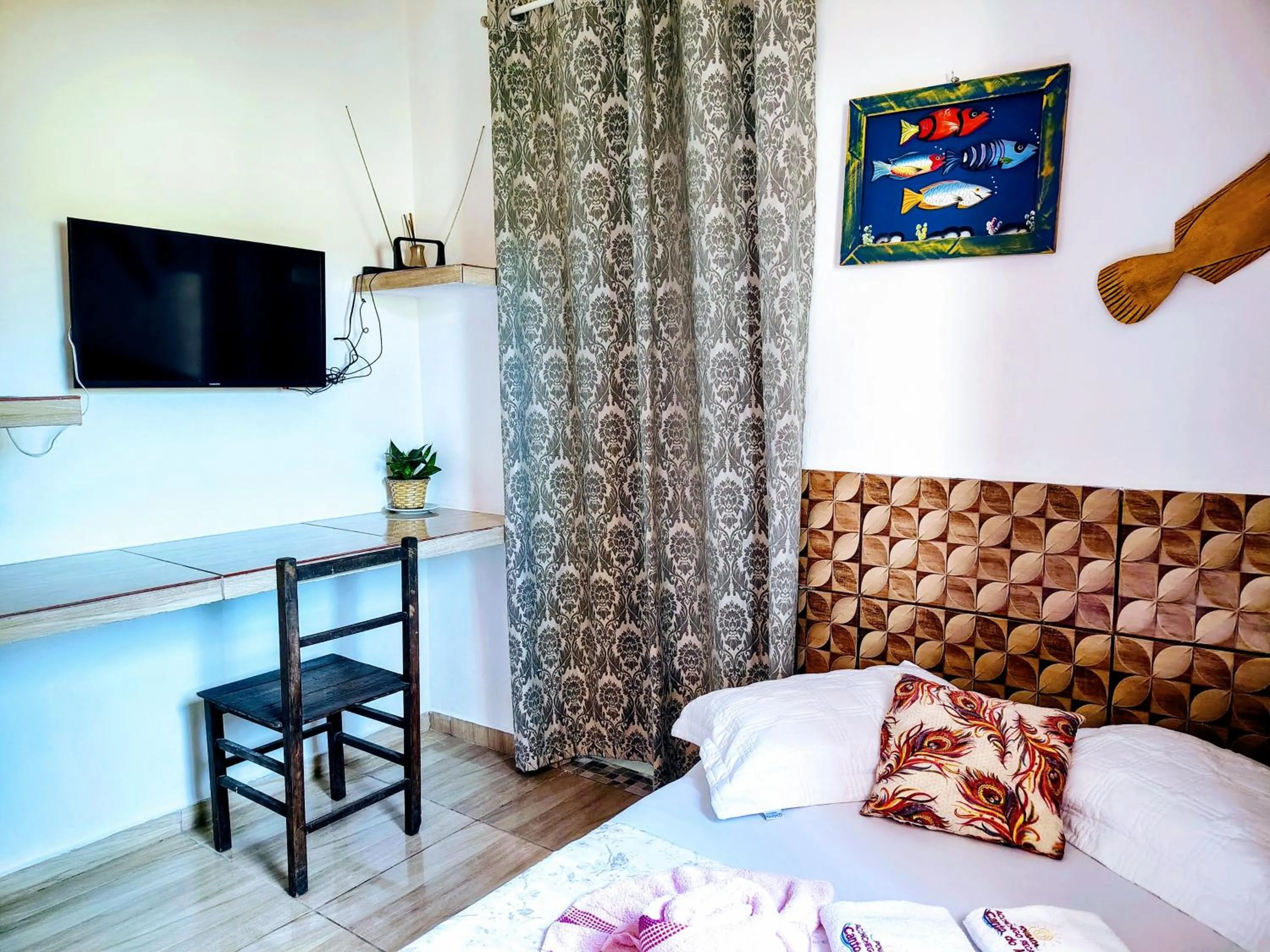 Bed in Pousada Aconchego Recanto Do Mar