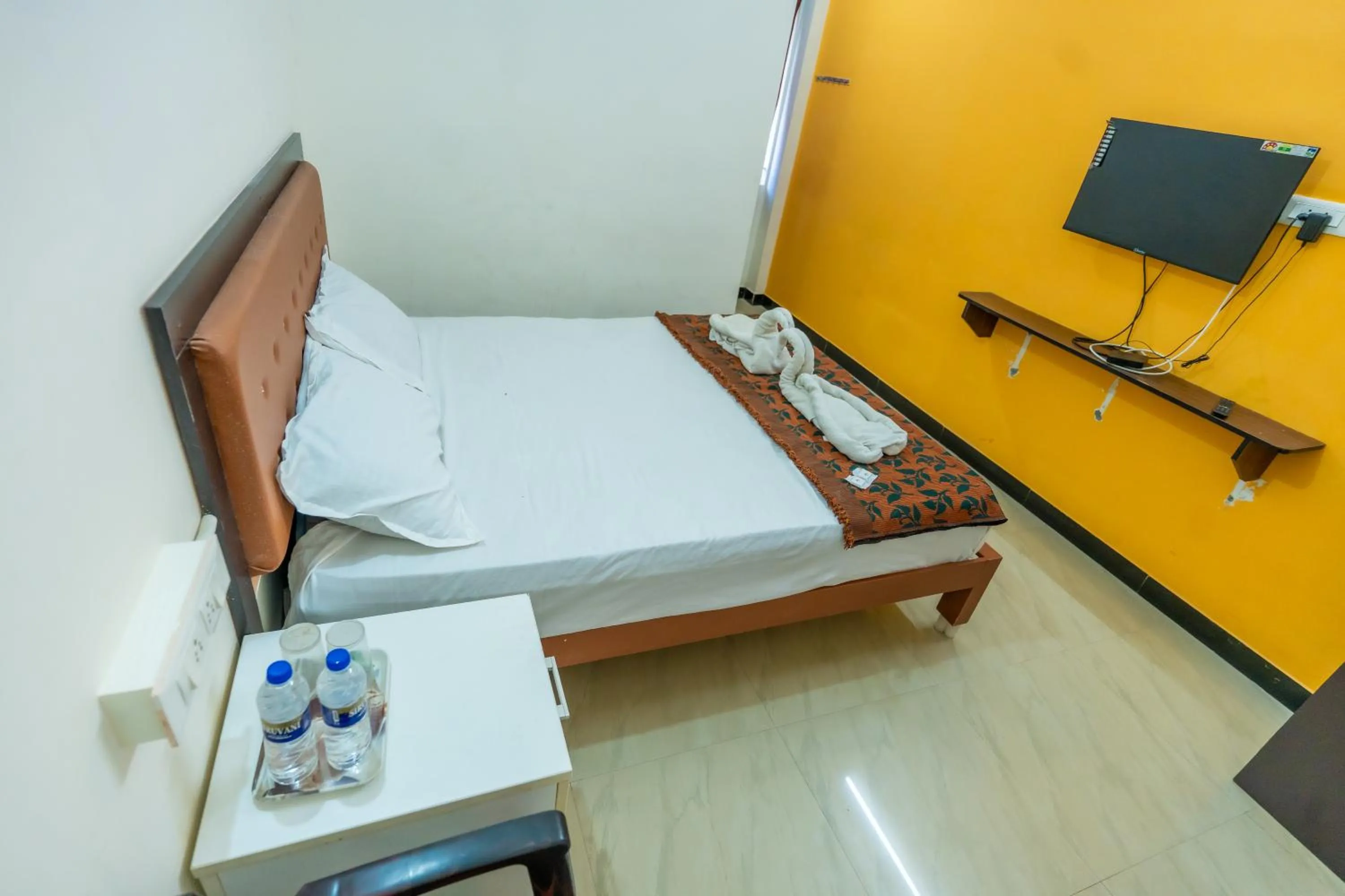 Photo of the whole room, Bed in Aryas Residency- Near Isha Foundation Coimbatore & Karunya University