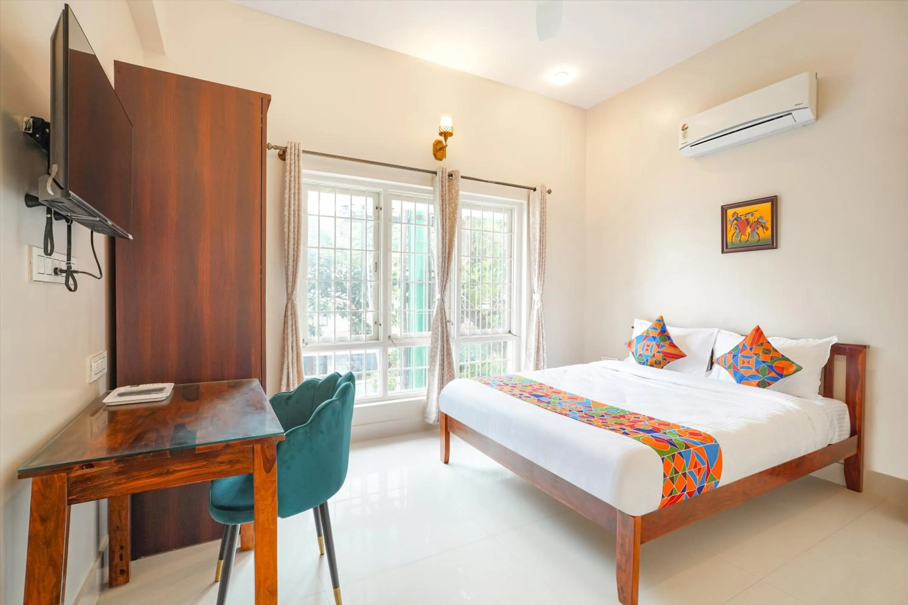 Bed in FabHotel Bougainvillea Suites - Horamavu