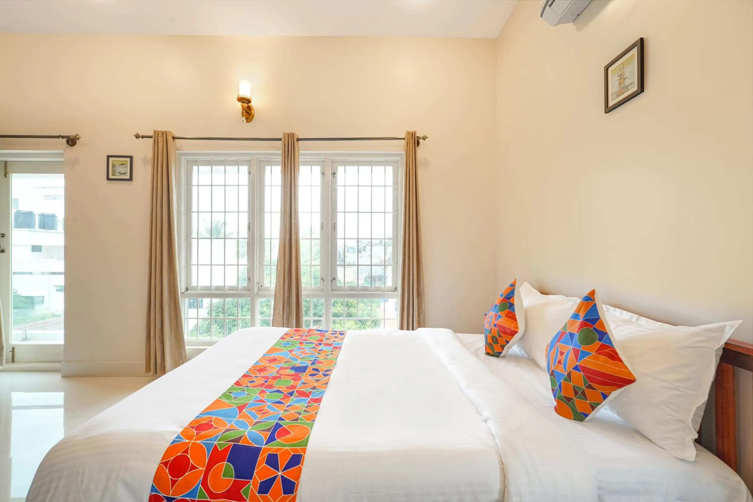 Bed in FabHotel Bougainvillea Suites - Horamavu
