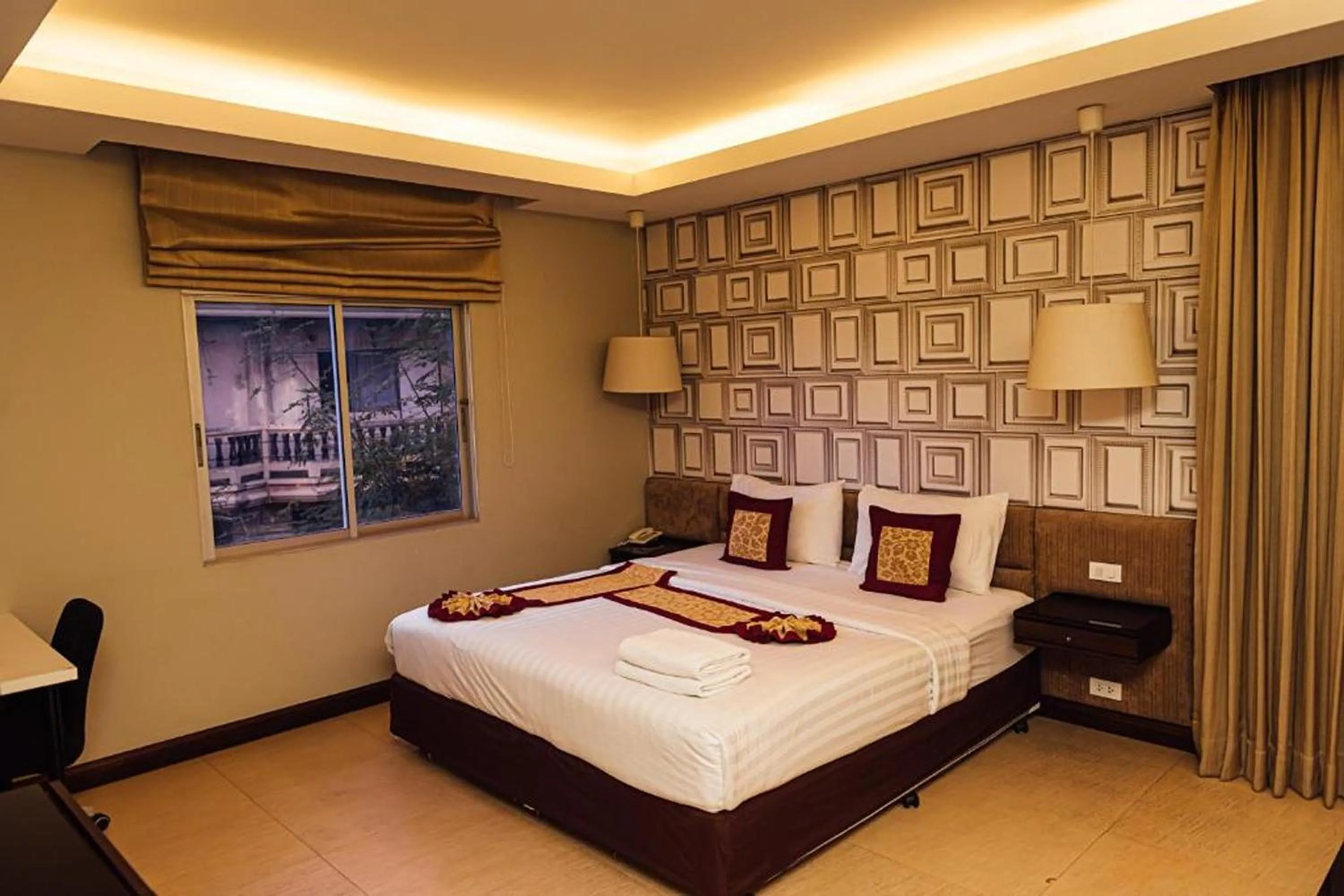 Bed in Gazebo Resort Pattaya