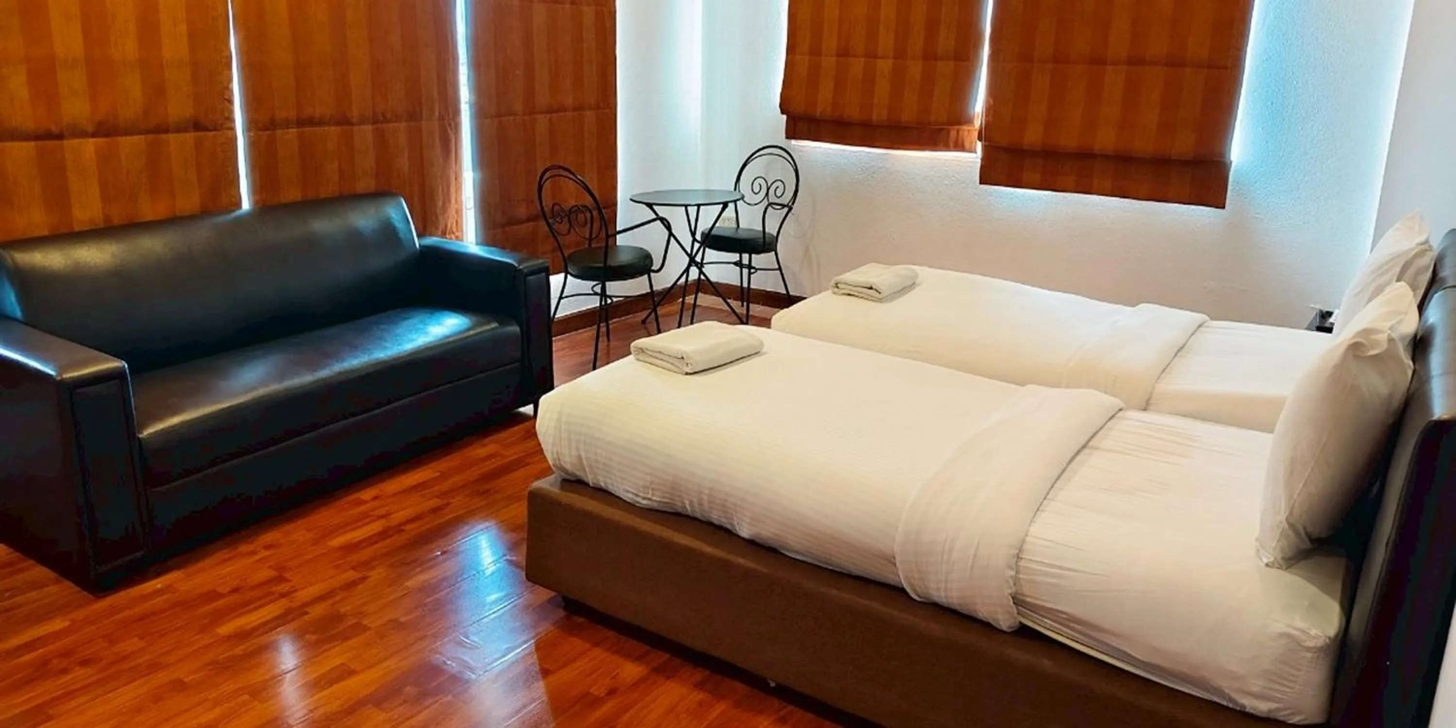 Bed in Gazebo Resort Pattaya