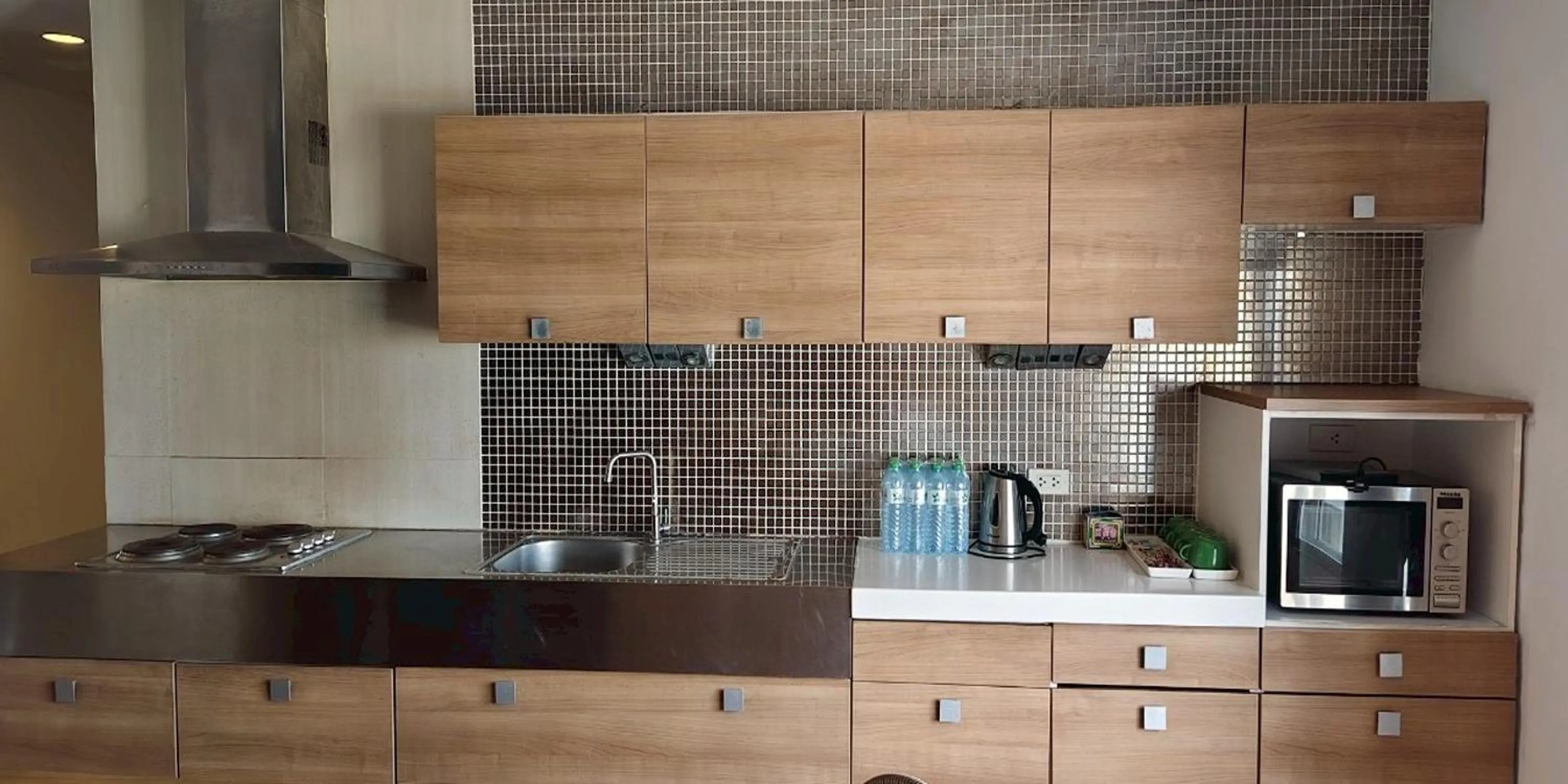 Kitchen or kitchenette in Gazebo Resort Pattaya