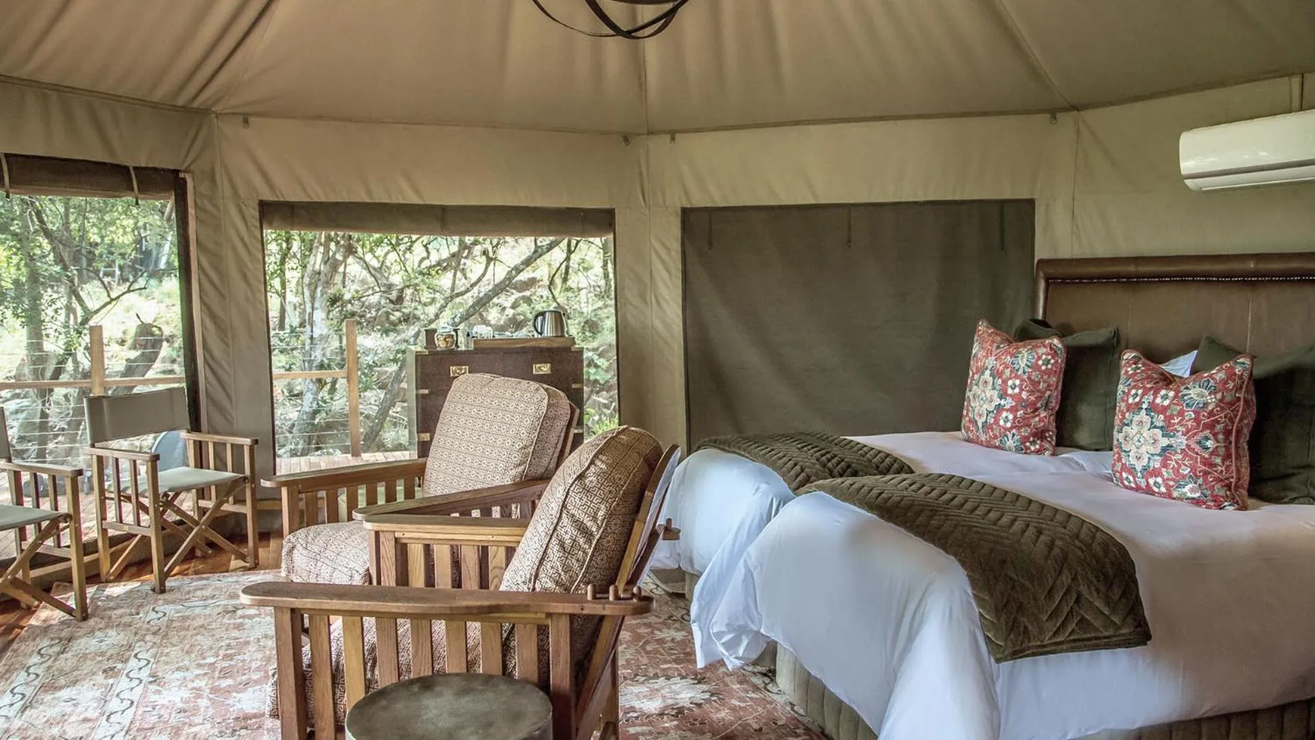 Seating area, Bed in Nkomazi Game Reserve by NEWMARK