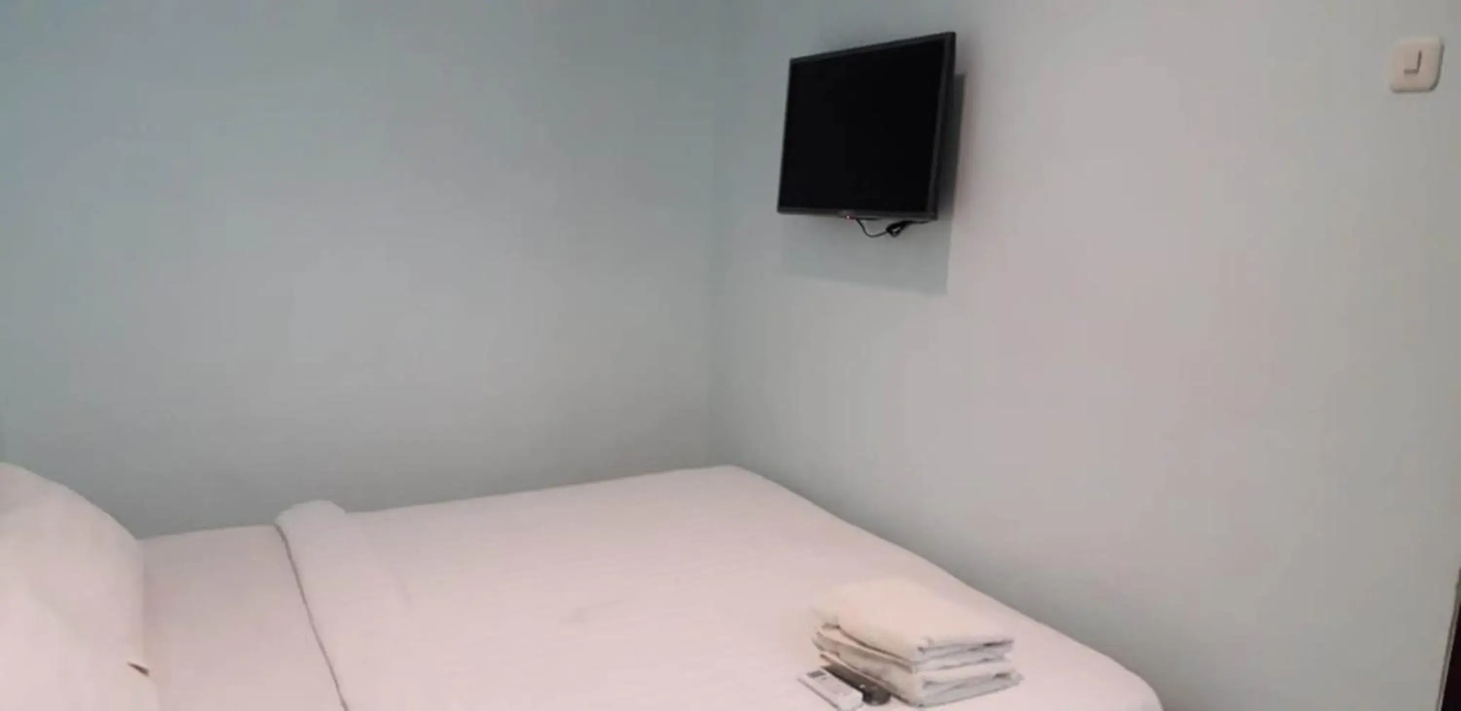 Bed in Shinta Guesthouse Bed in Shinta Guesthouse