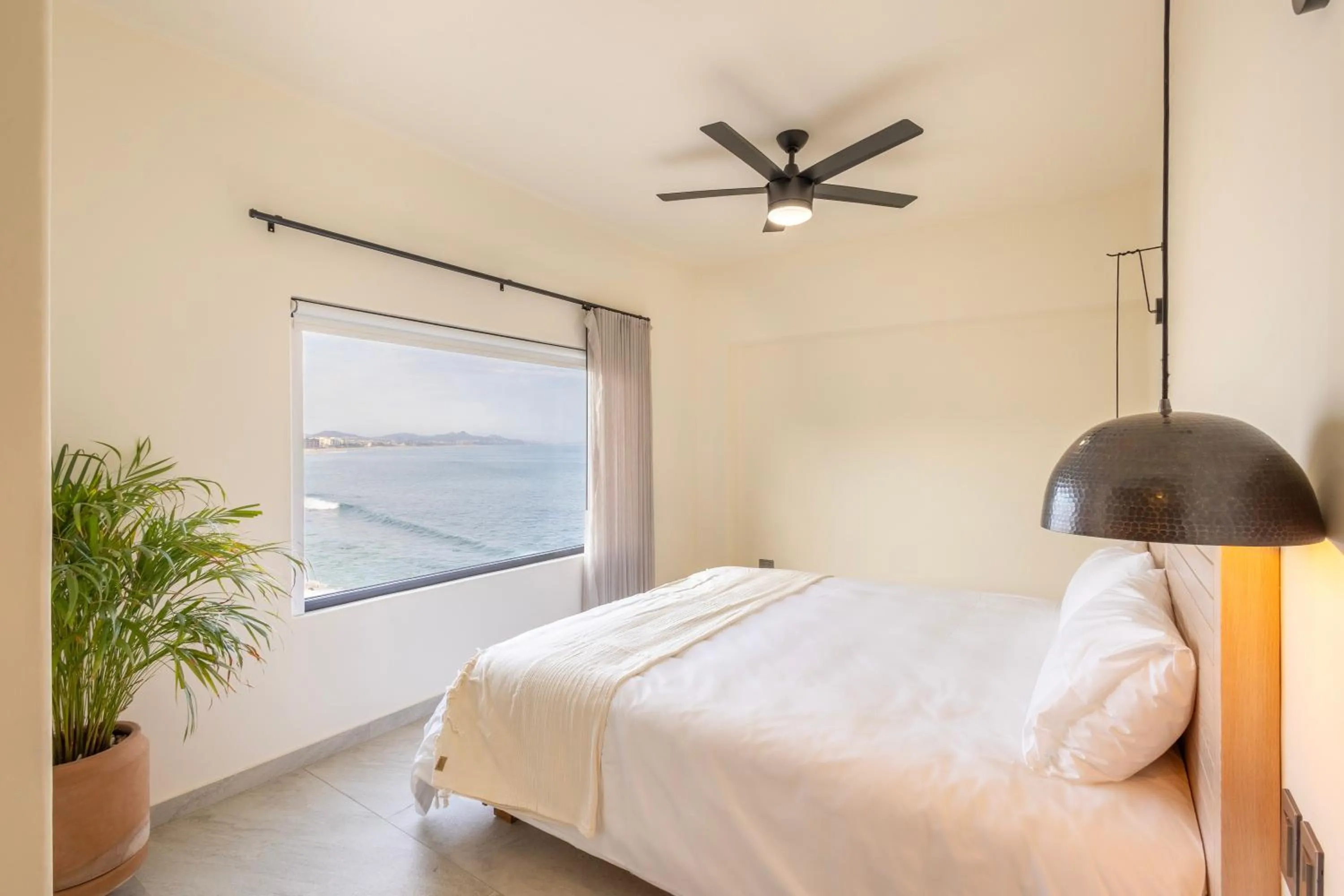 Bed in Cabo Break Hotel