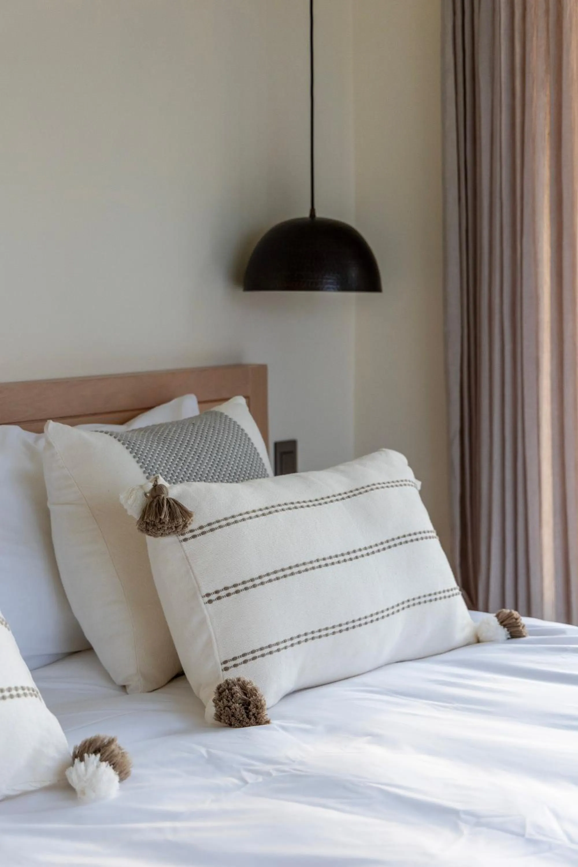 Bed in Cabo Break Hotel