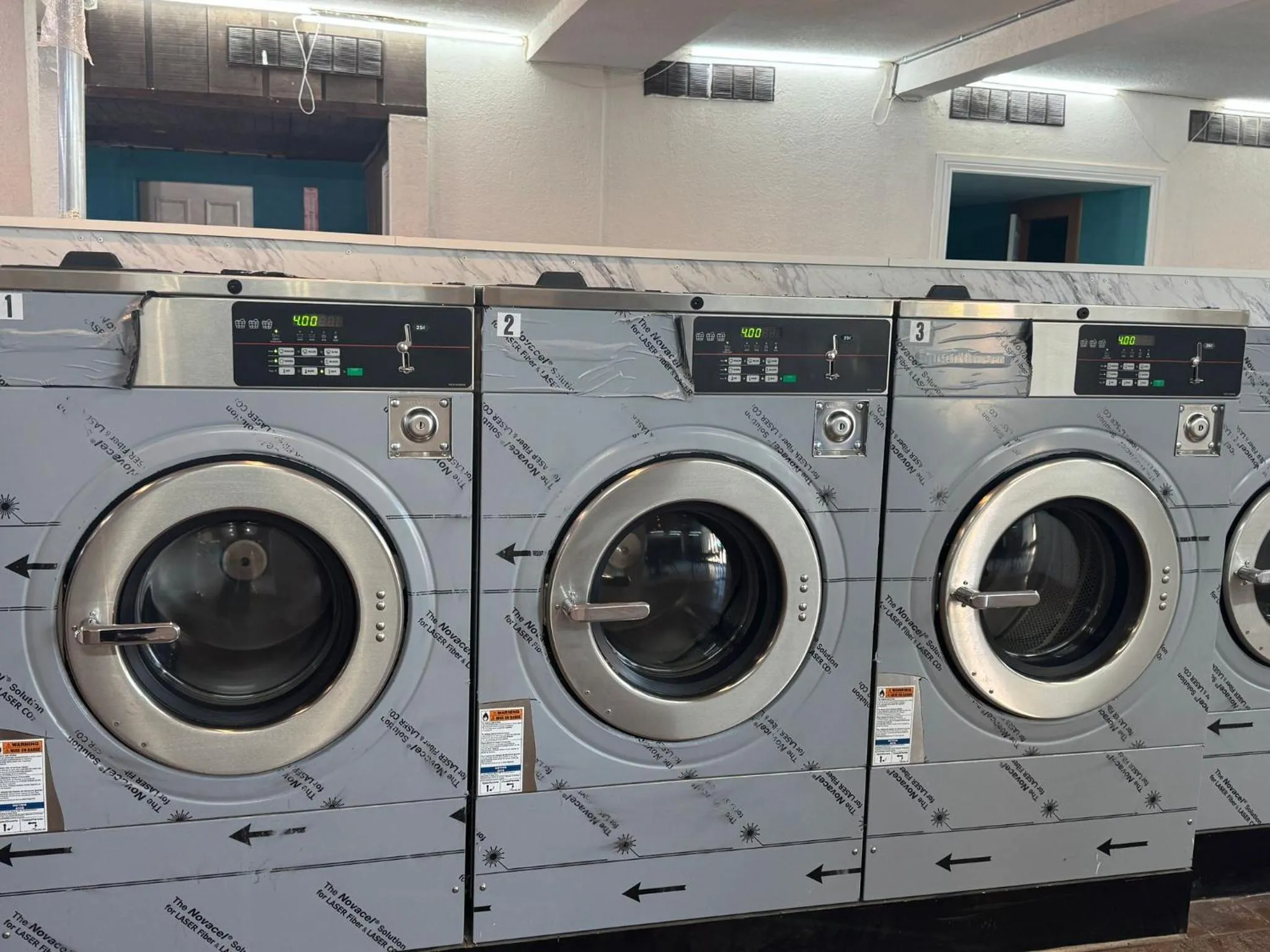 washing machine in Alien Residence Inn