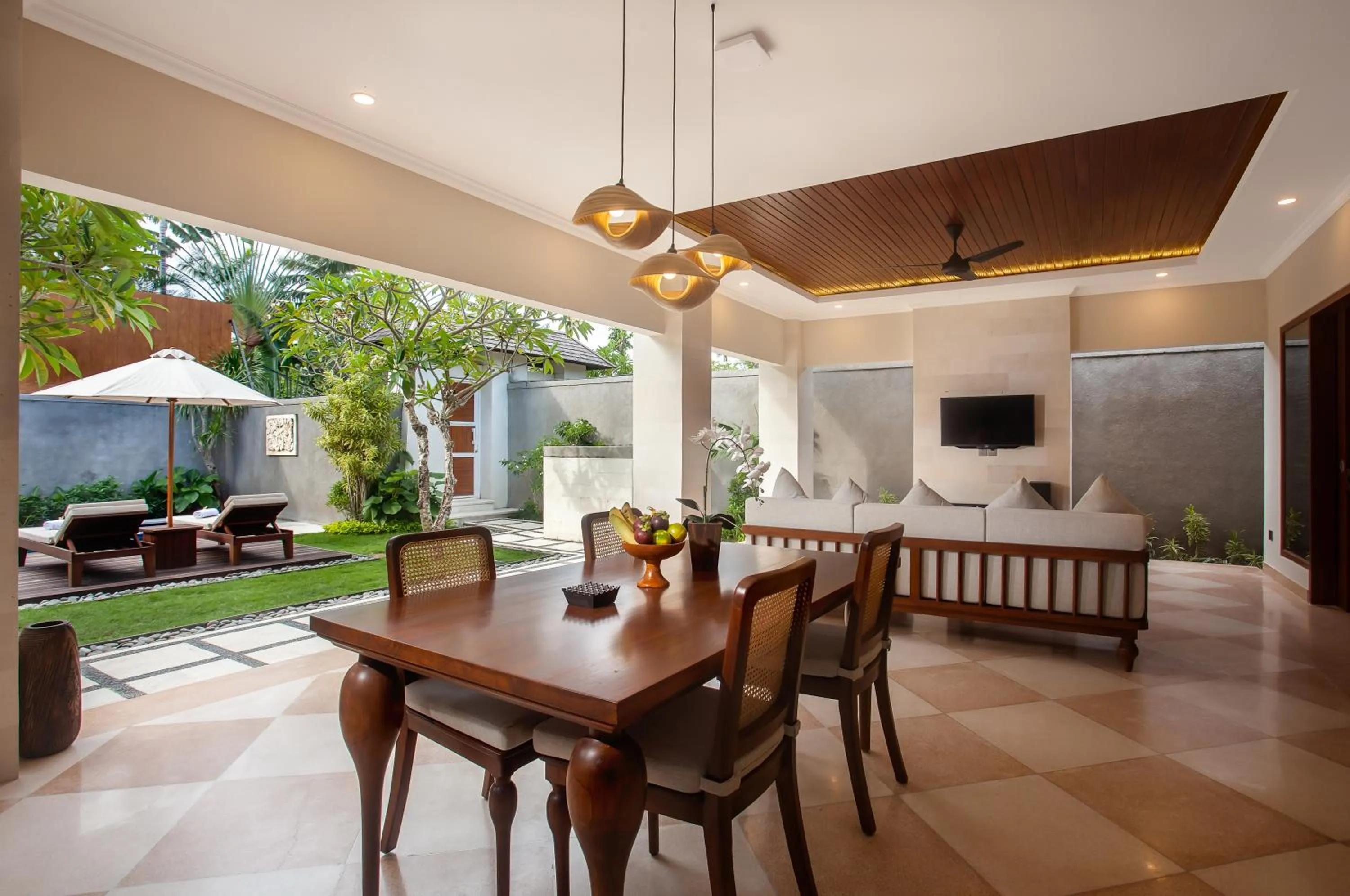 Communal lounge/ TV room in Ghana Villa Seminyak by GenuineHost