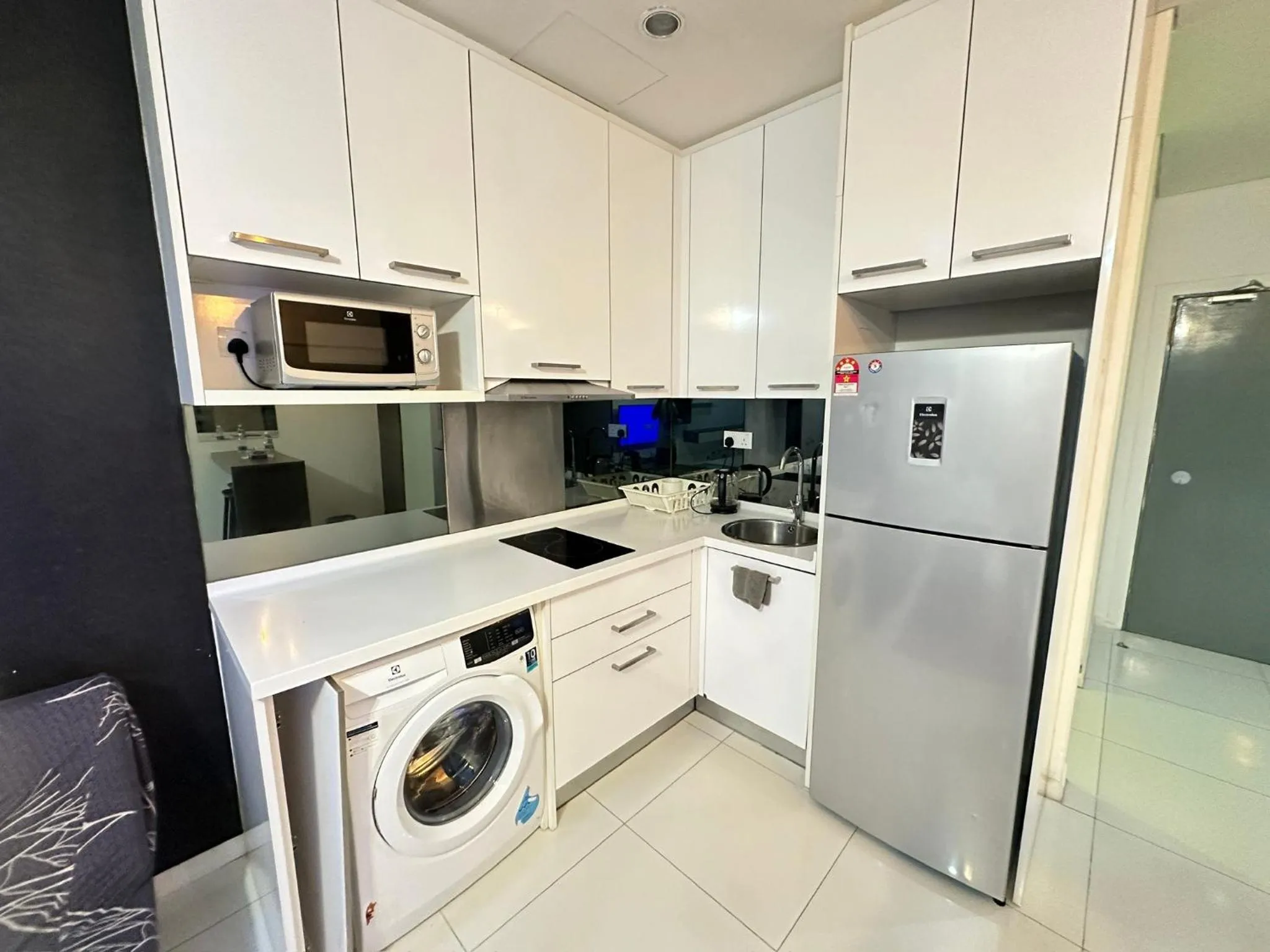 Kitchen or kitchenette in Summer Suites KLCC by Luna KL