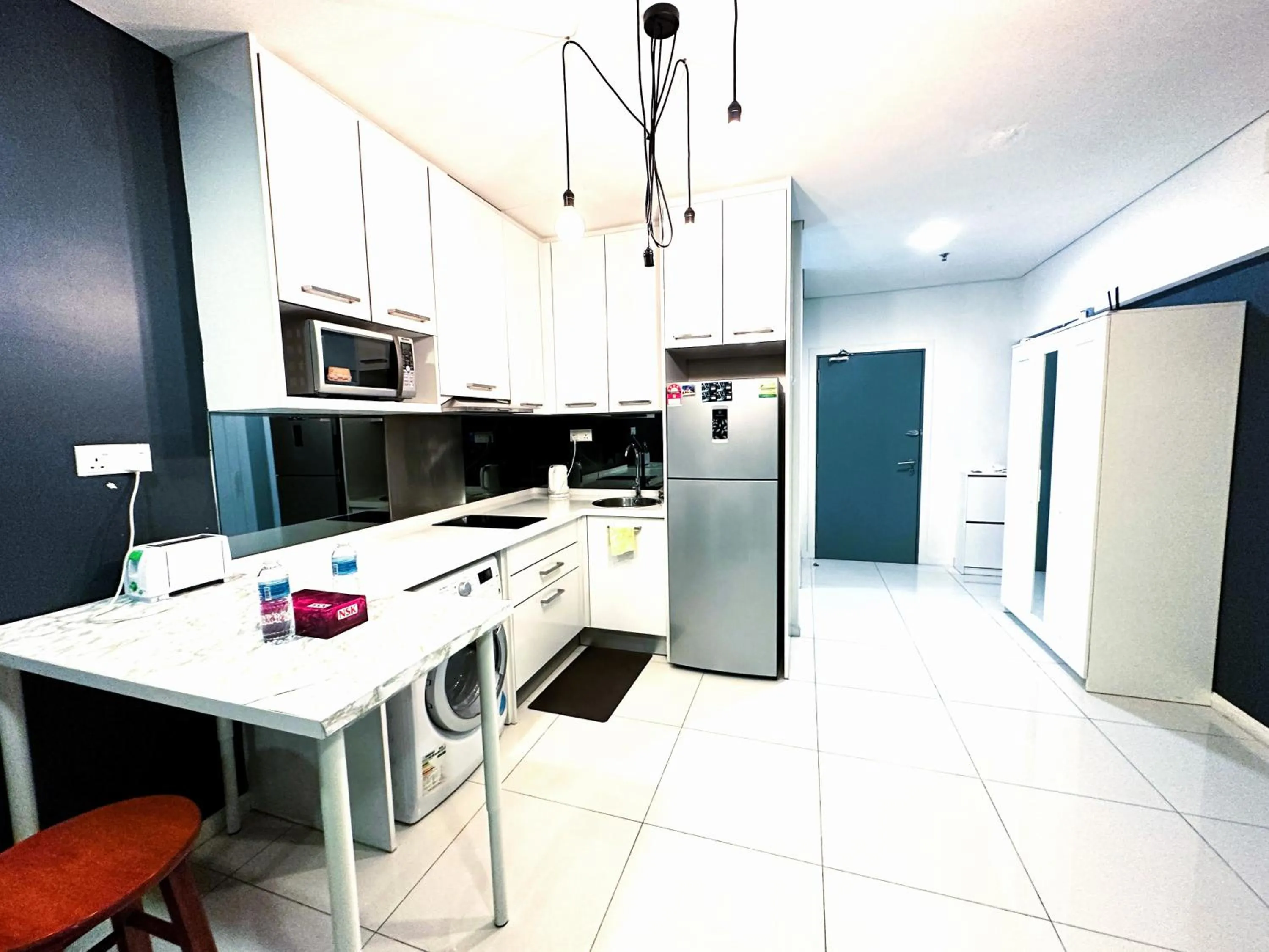 Kitchen or kitchenette in Summer Suites KLCC by Luna KL