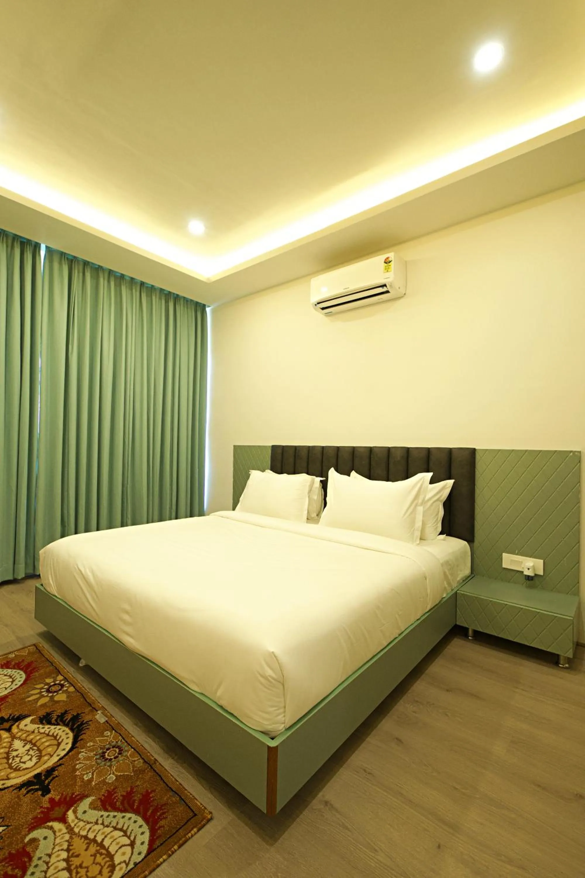 Bed in Veerdency Luxury resort