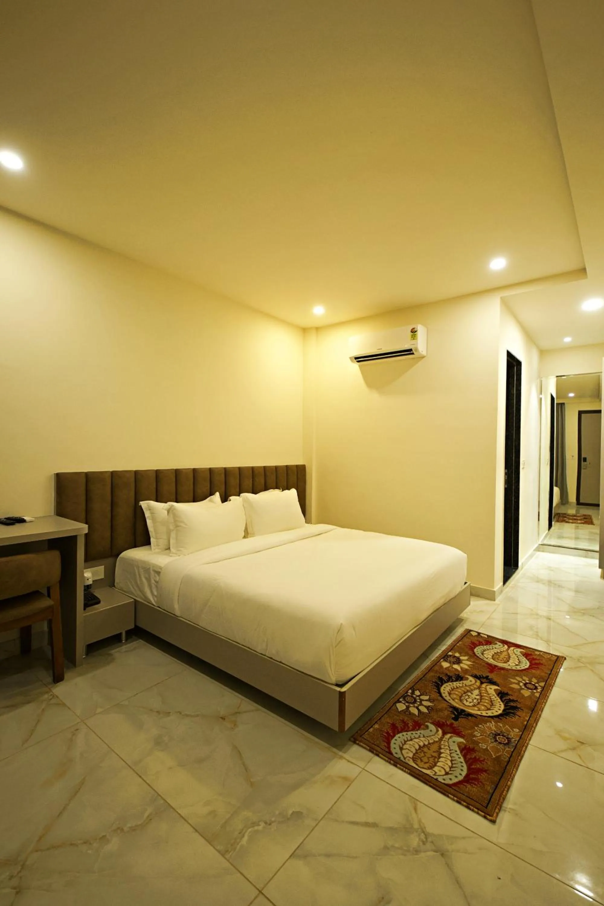 Bed in Veerdency Luxury resort