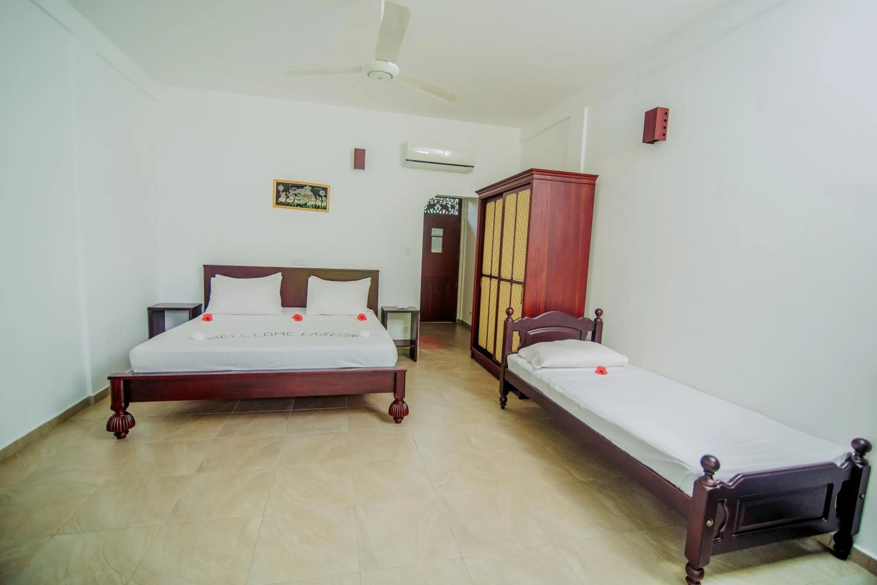 Bed in Lagoon Bentota Resort