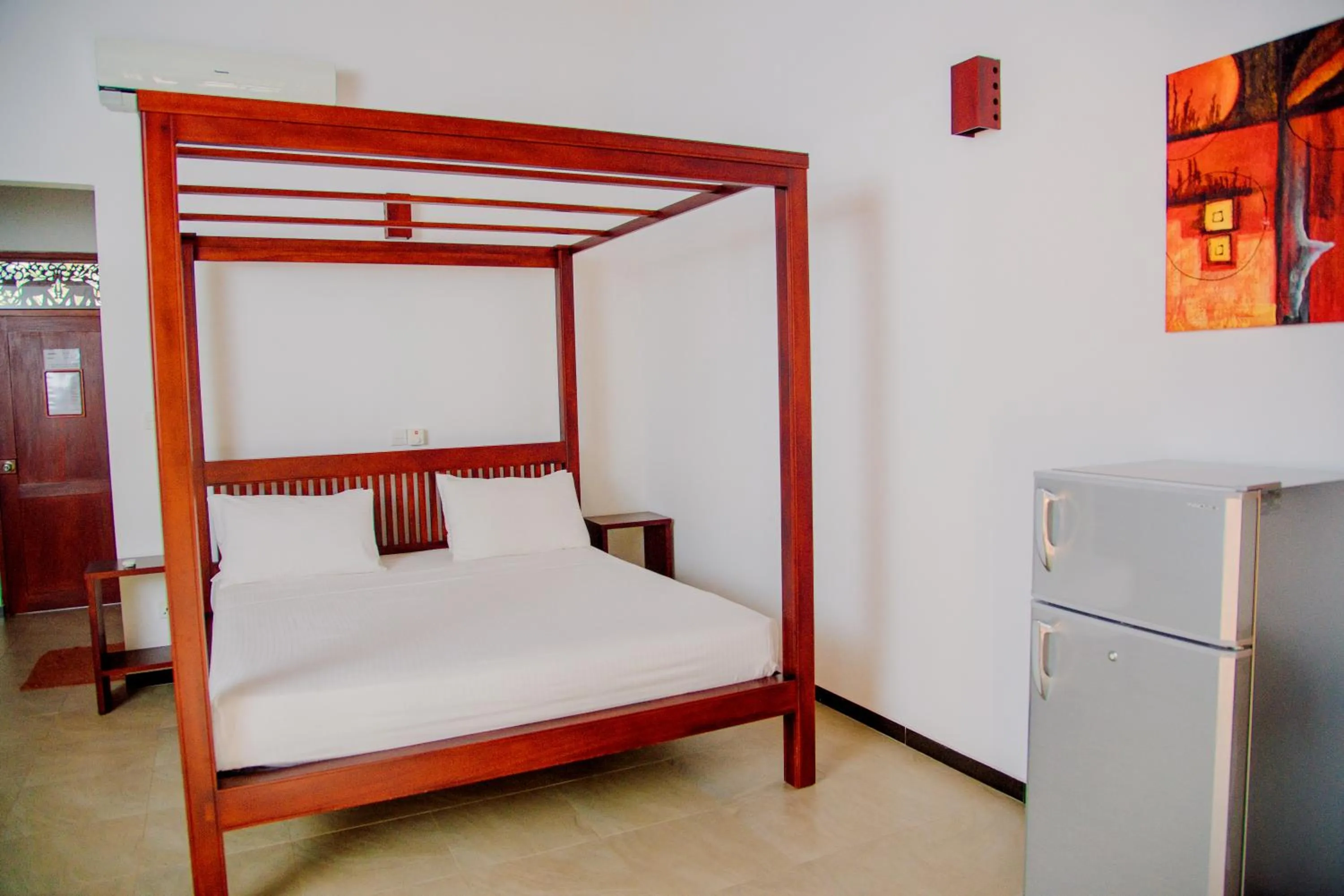 Bed in Lagoon Bentota Resort