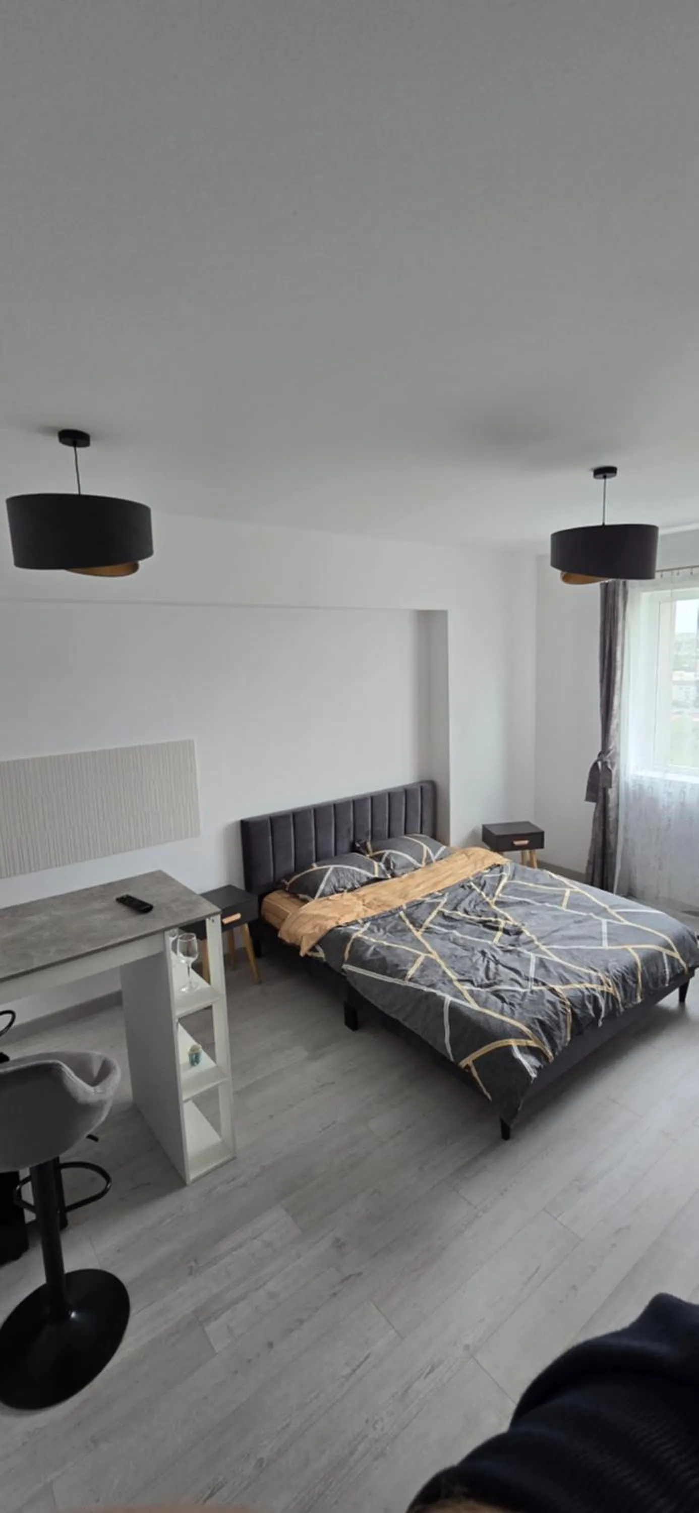 Bed in Camera de Inchiriat in Rin Grand Hotel