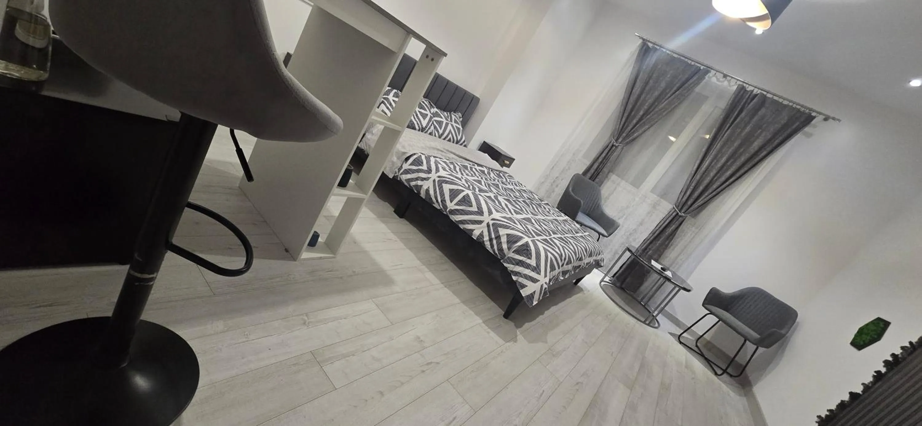 Bed in Camera de Inchiriat in Rin Grand Hotel