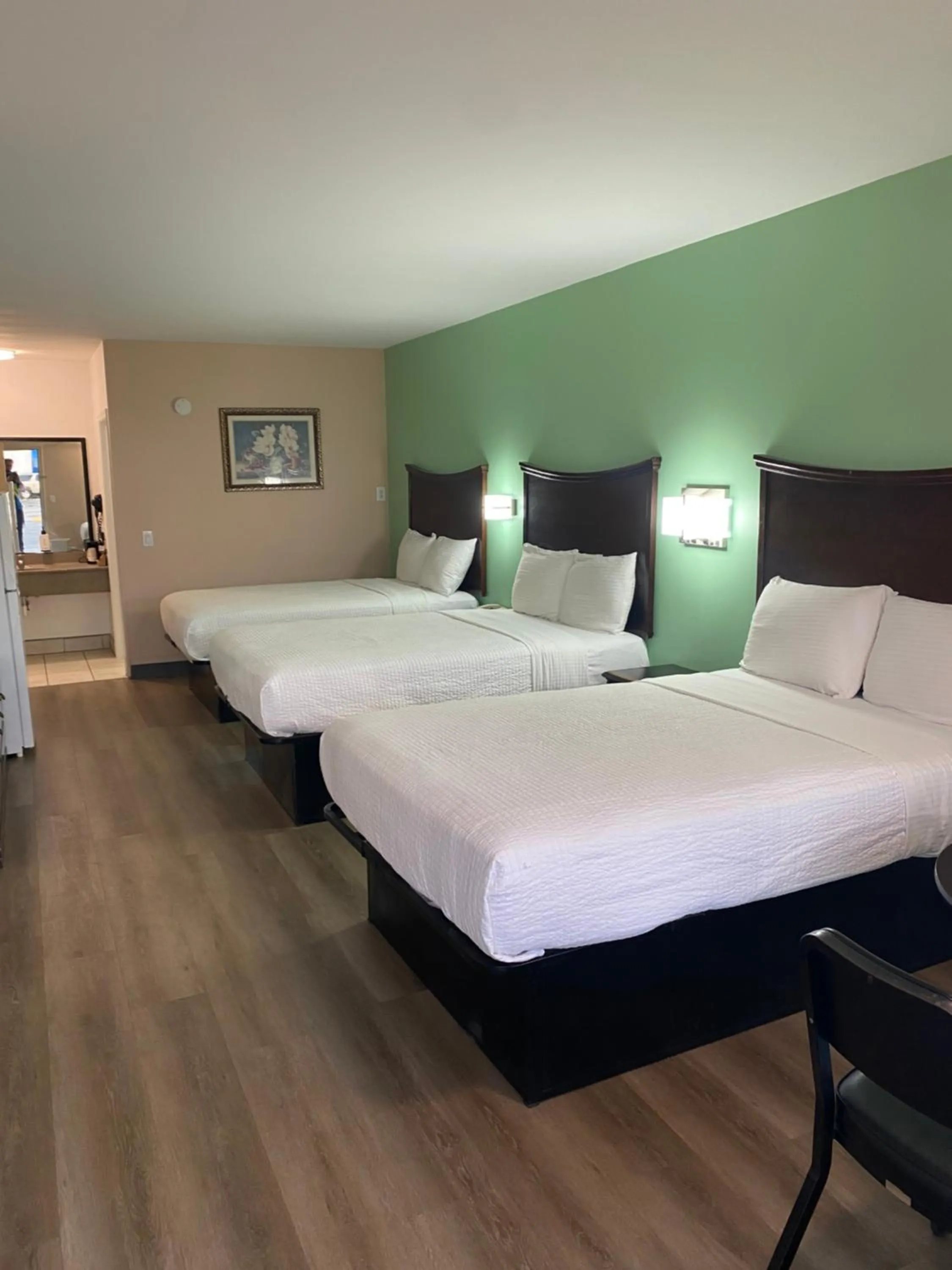 Bed in Security Inn and Suites