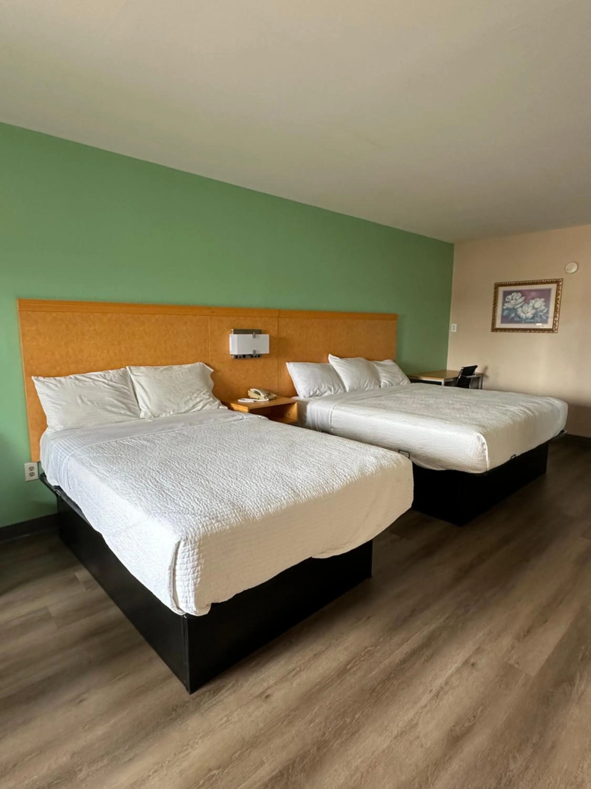 Bed in Security Inn and Suites