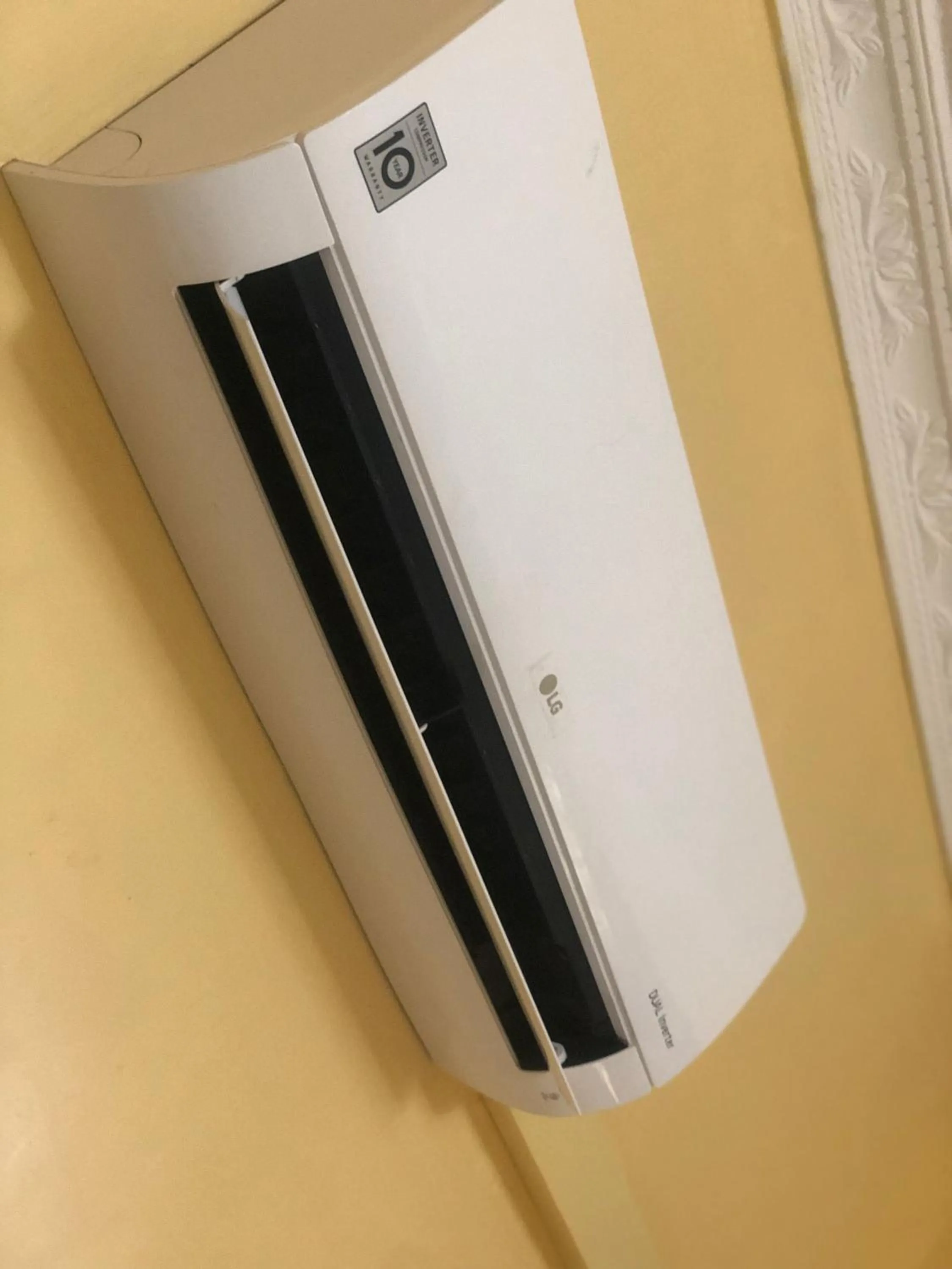 air conditioner, TV/Entertainment Center in CBA Hotel