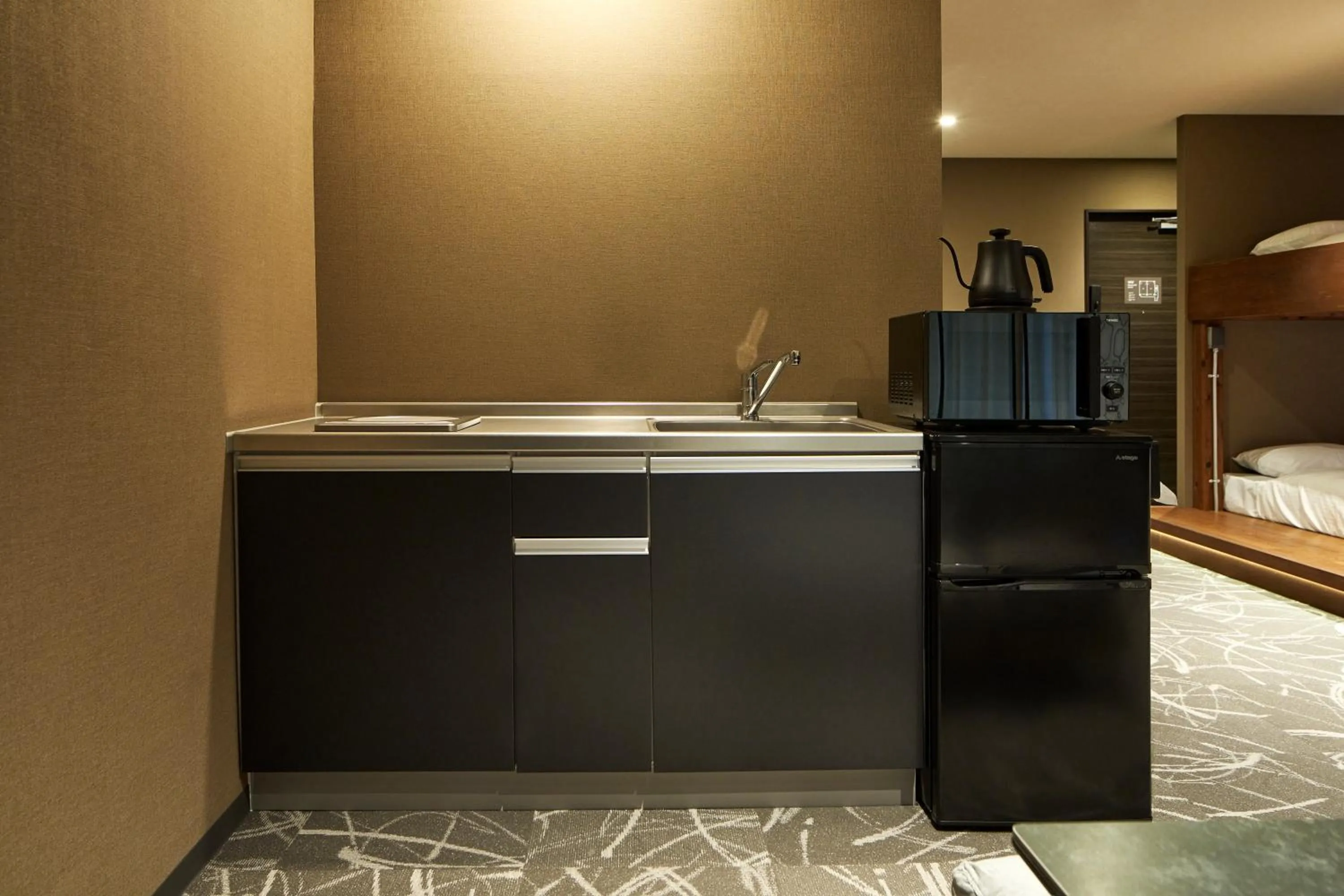 Photo of the whole room in B/C HOTEL NAHA Hotel with Rental Car