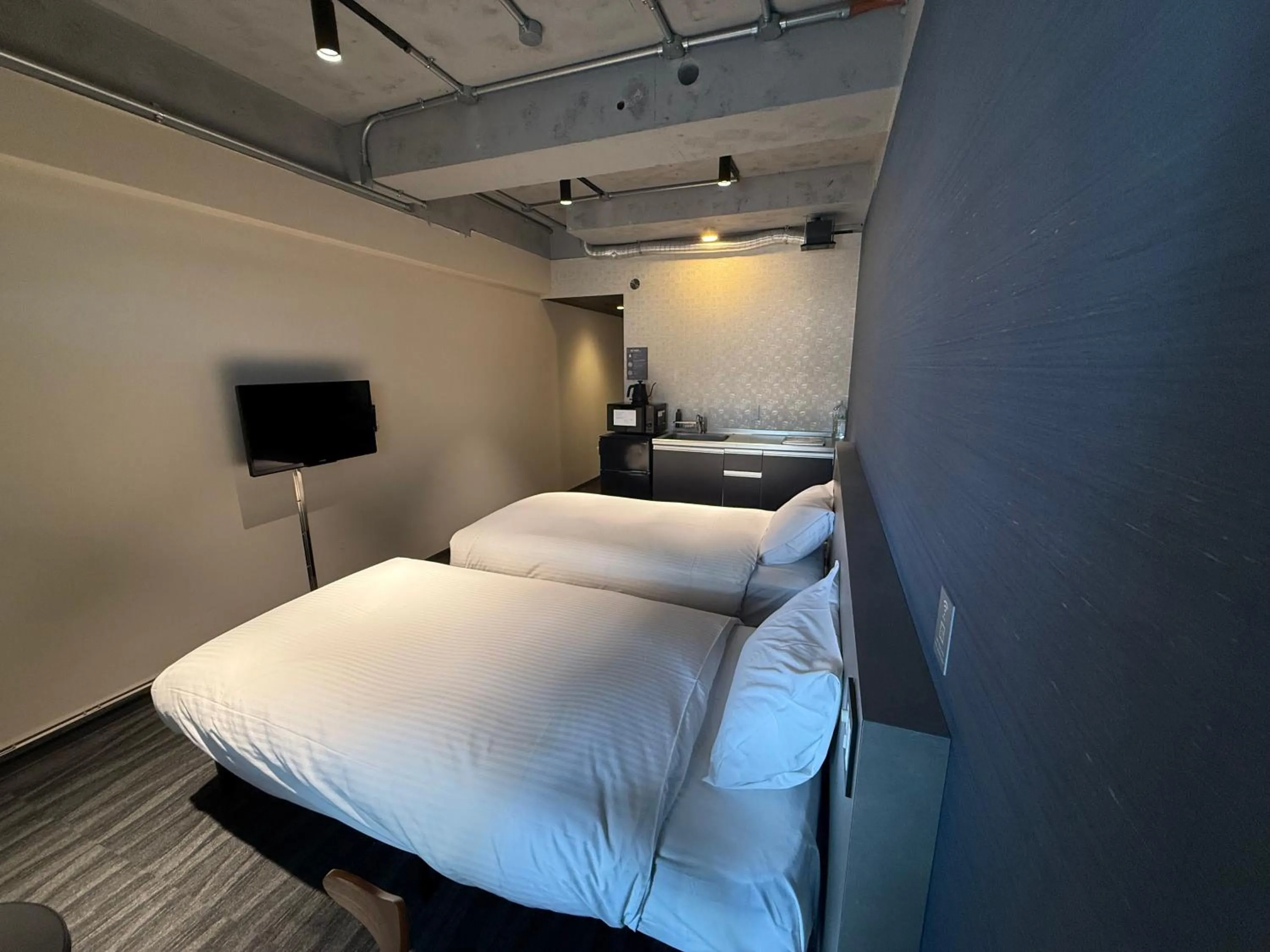 Bedroom, Bed in B/C HOTEL NAHA Hotel with Rental Car