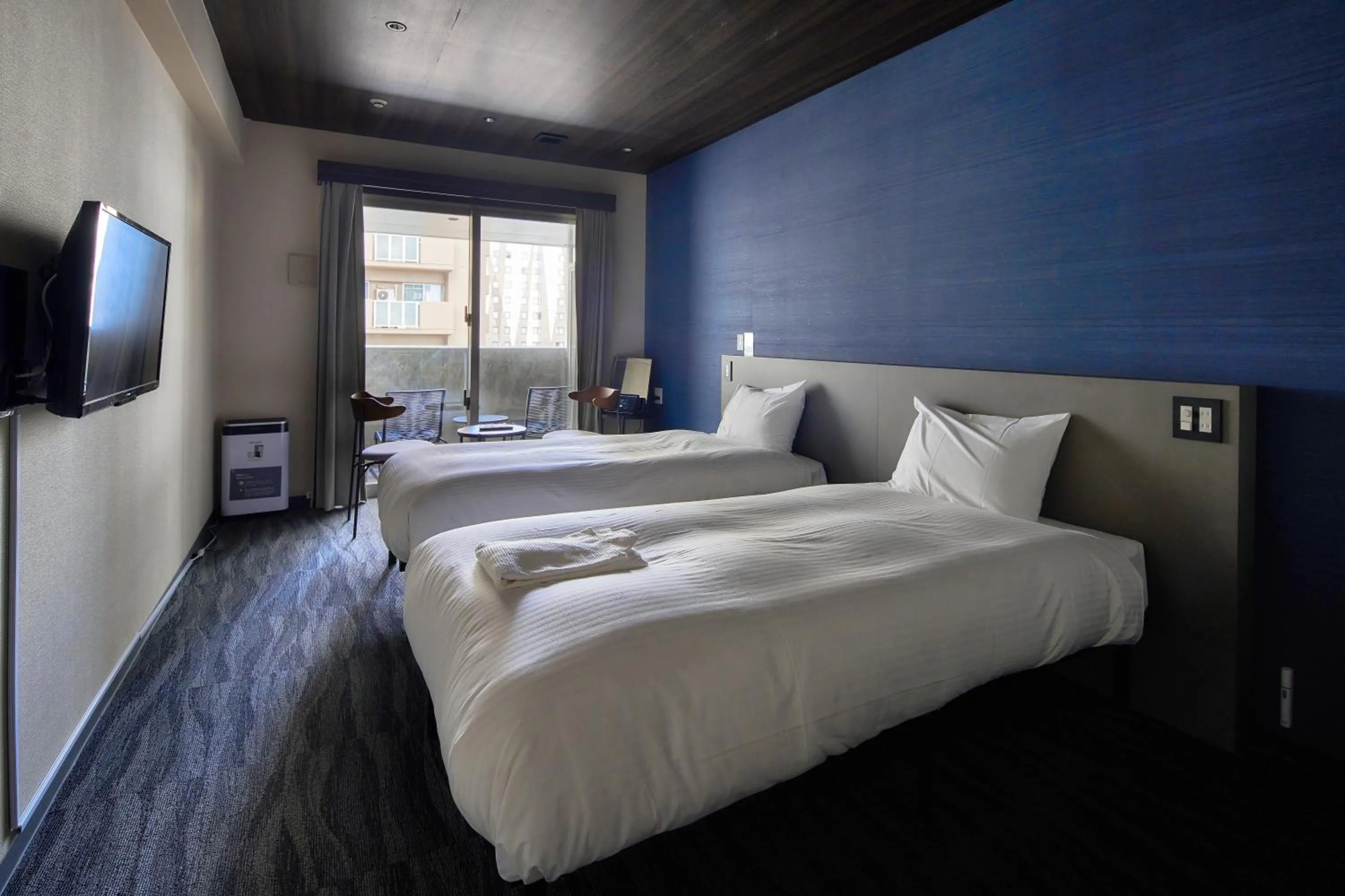 Photo of the whole room, Bed in B/C HOTEL NAHA Hotel with Rental Car