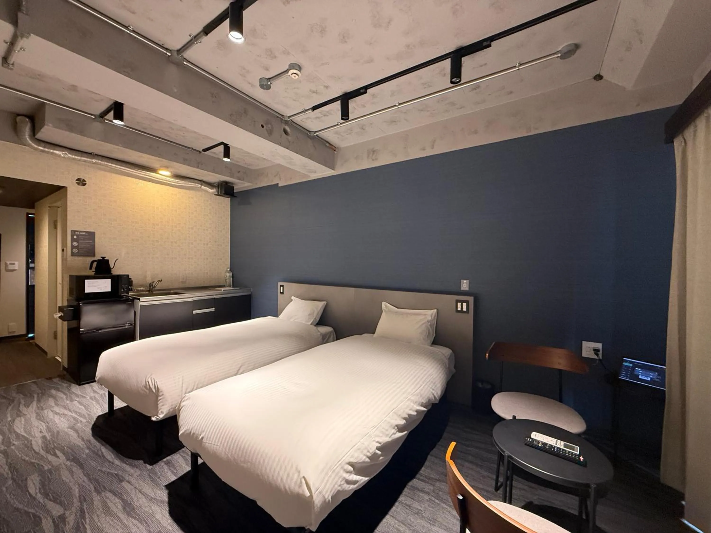 Bedroom, Bed in B/C HOTEL NAHA Hotel with Rental Car