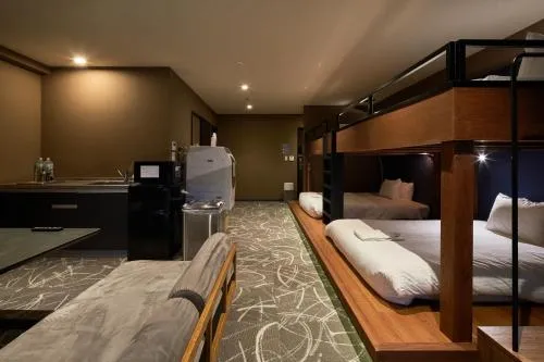 Kitchen or kitchenette, Bed in B/C HOTEL NAHA Hotel with Rental Car