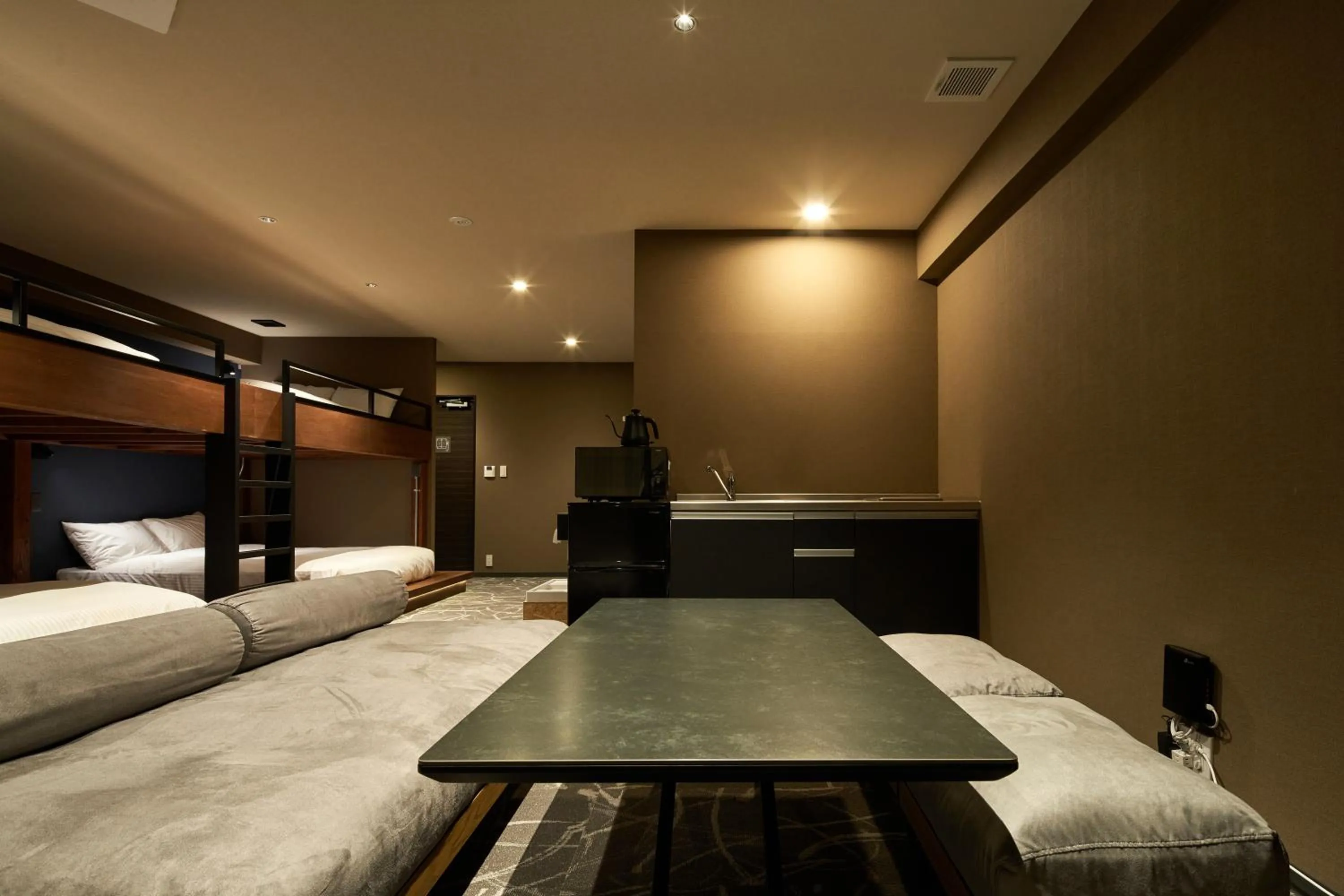 Photo of the whole room, Bed in B/C HOTEL NAHA Hotel with Rental Car