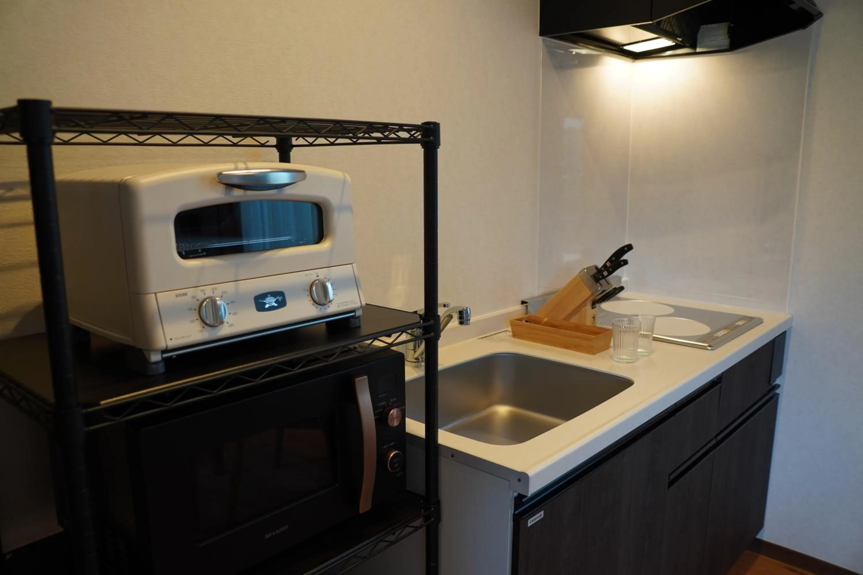 kitchen in SAUNA VILLA 然