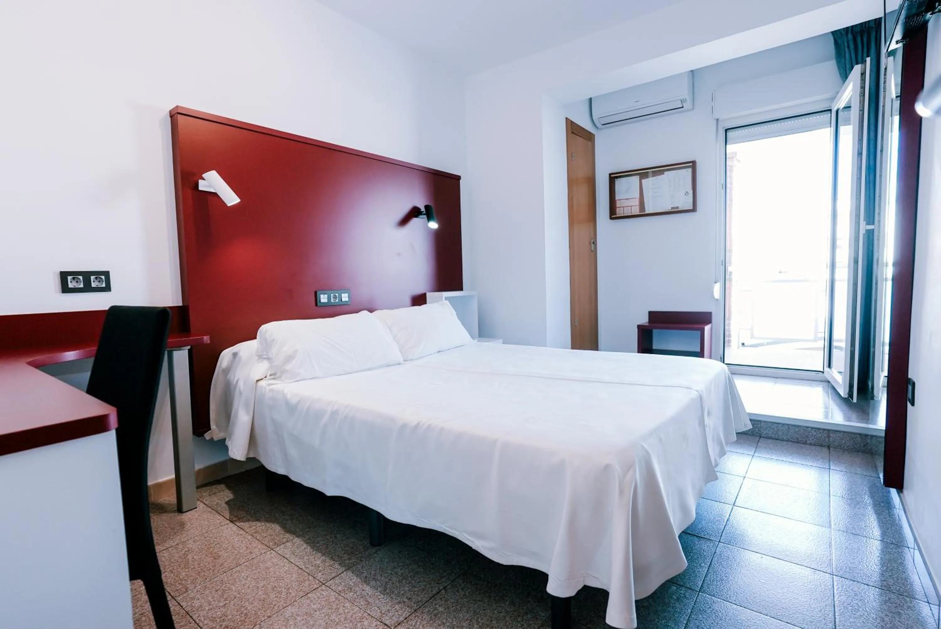 Bed in Hospedium Hotel Continental