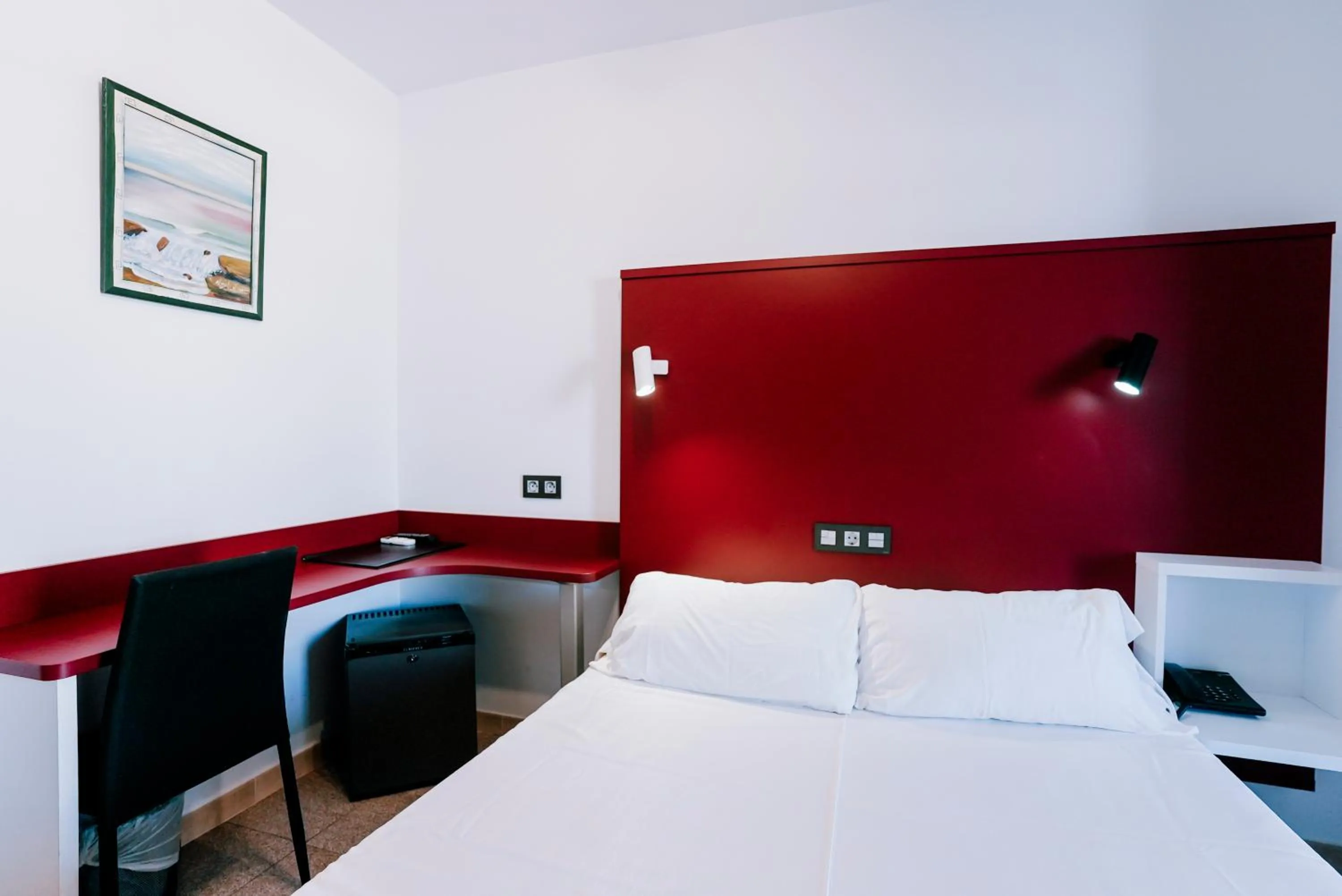 Bed in Hospedium Hotel Continental