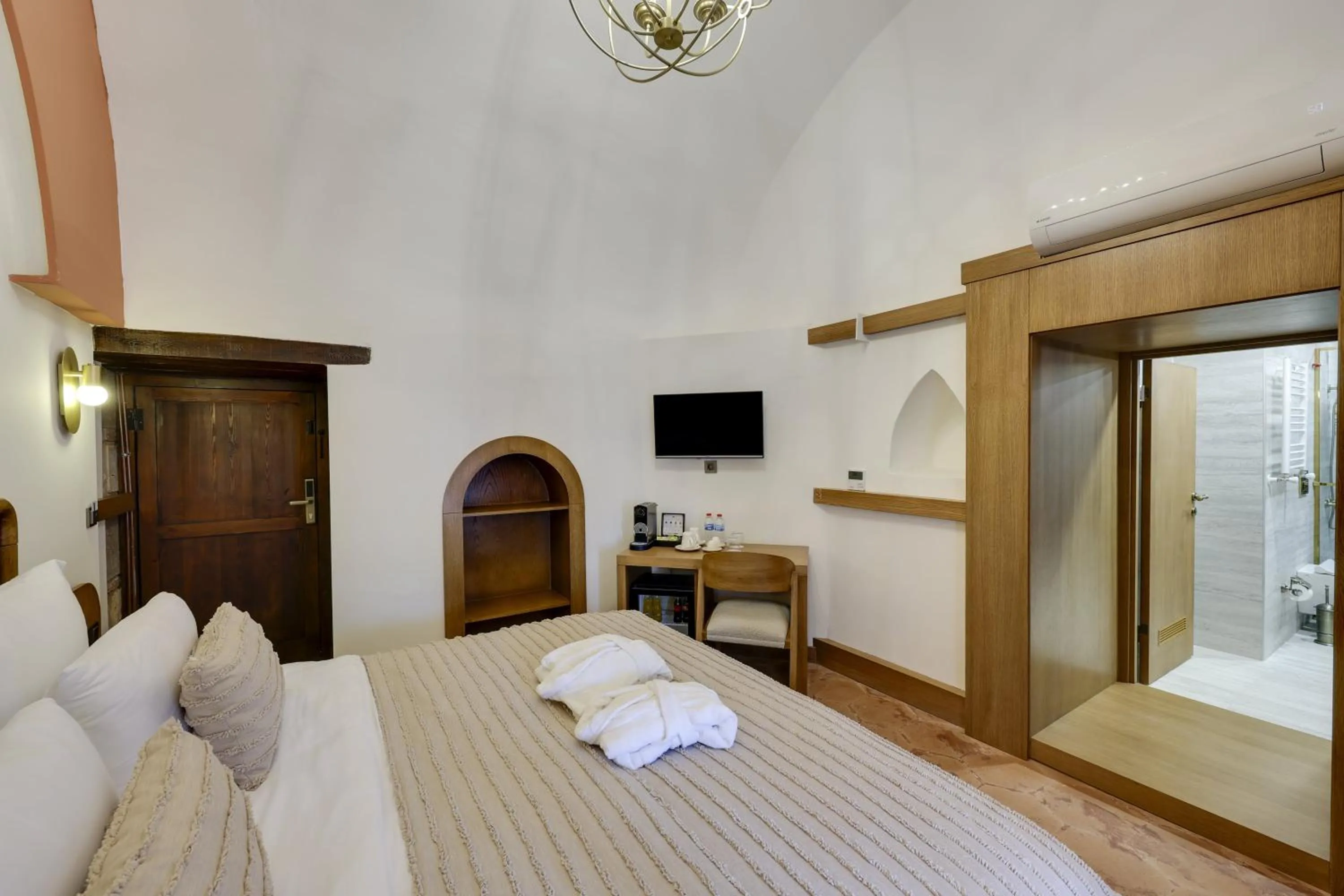 Bed in Silk Road Museum Hotel