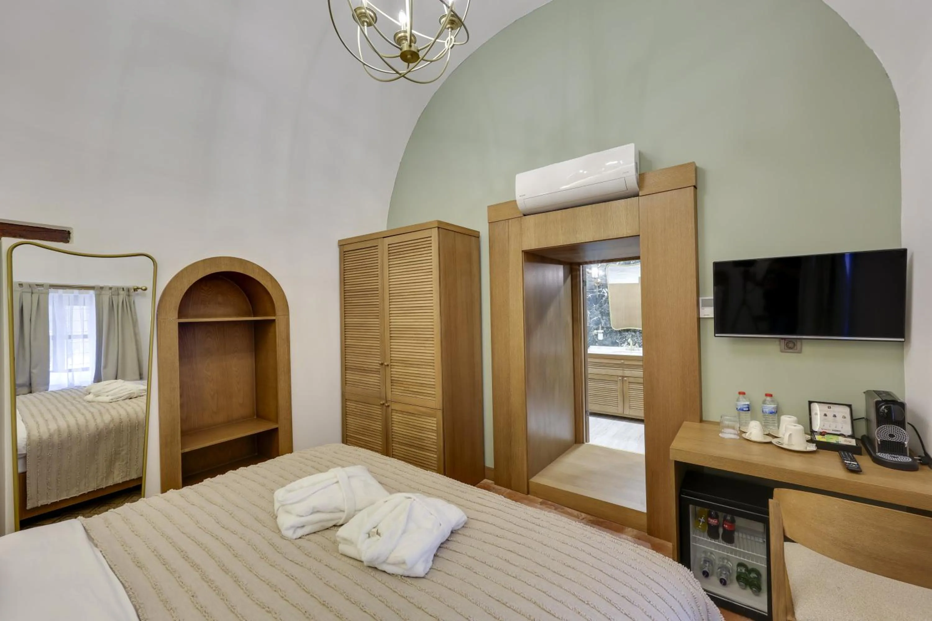 Bed in Silk Road Museum Hotel