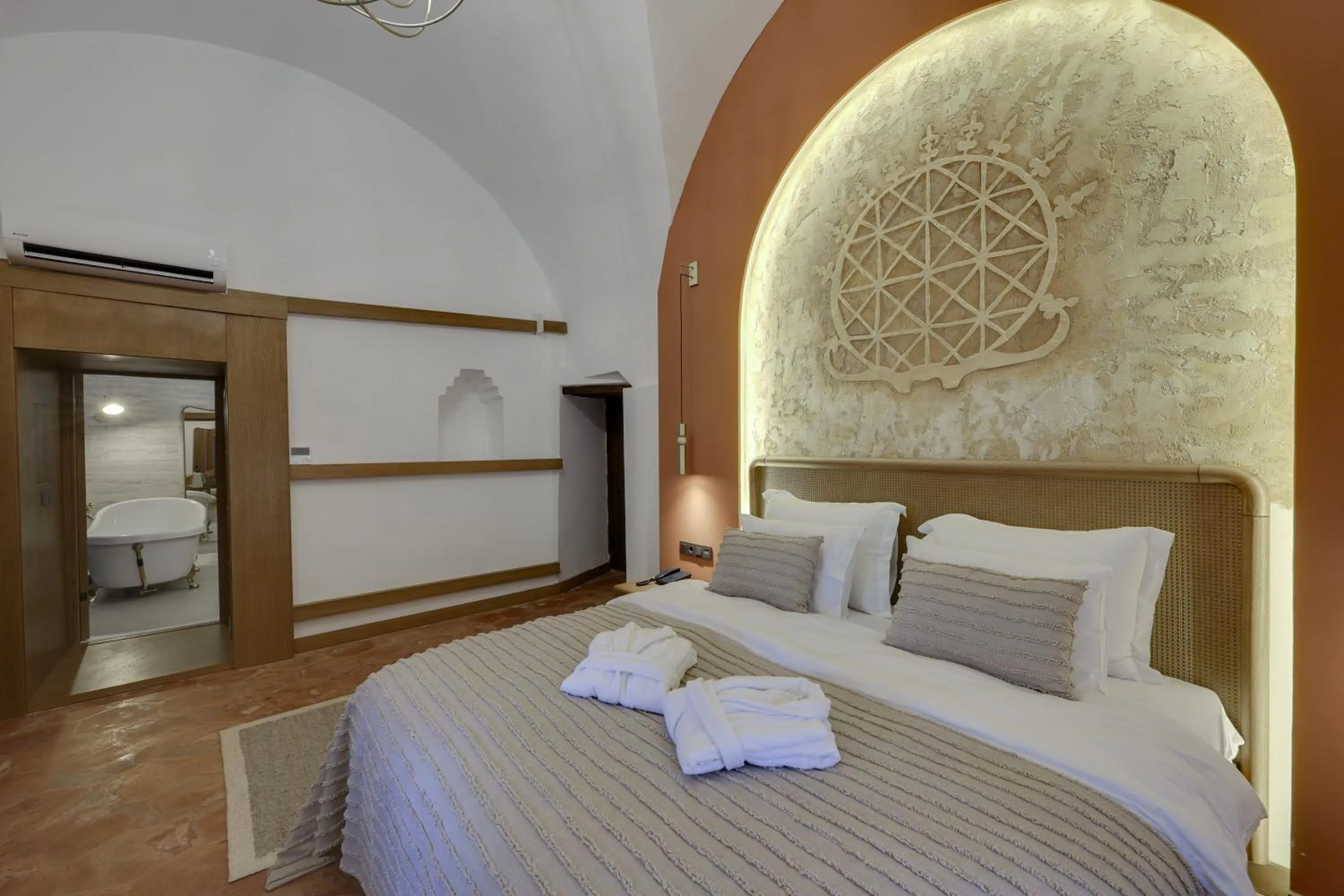 Bed in Silk Road Museum Hotel