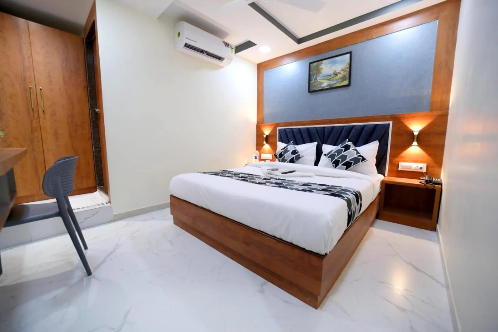 Photo of the whole room, Bed in N.M. Hotel