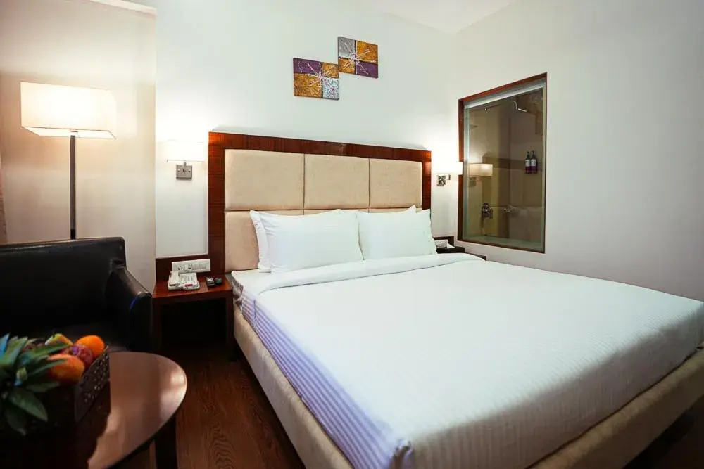 Bedroom, Bed in Ramee The Srinivas Palace Bedroom, Bed in Ramee The Srinivas Palace