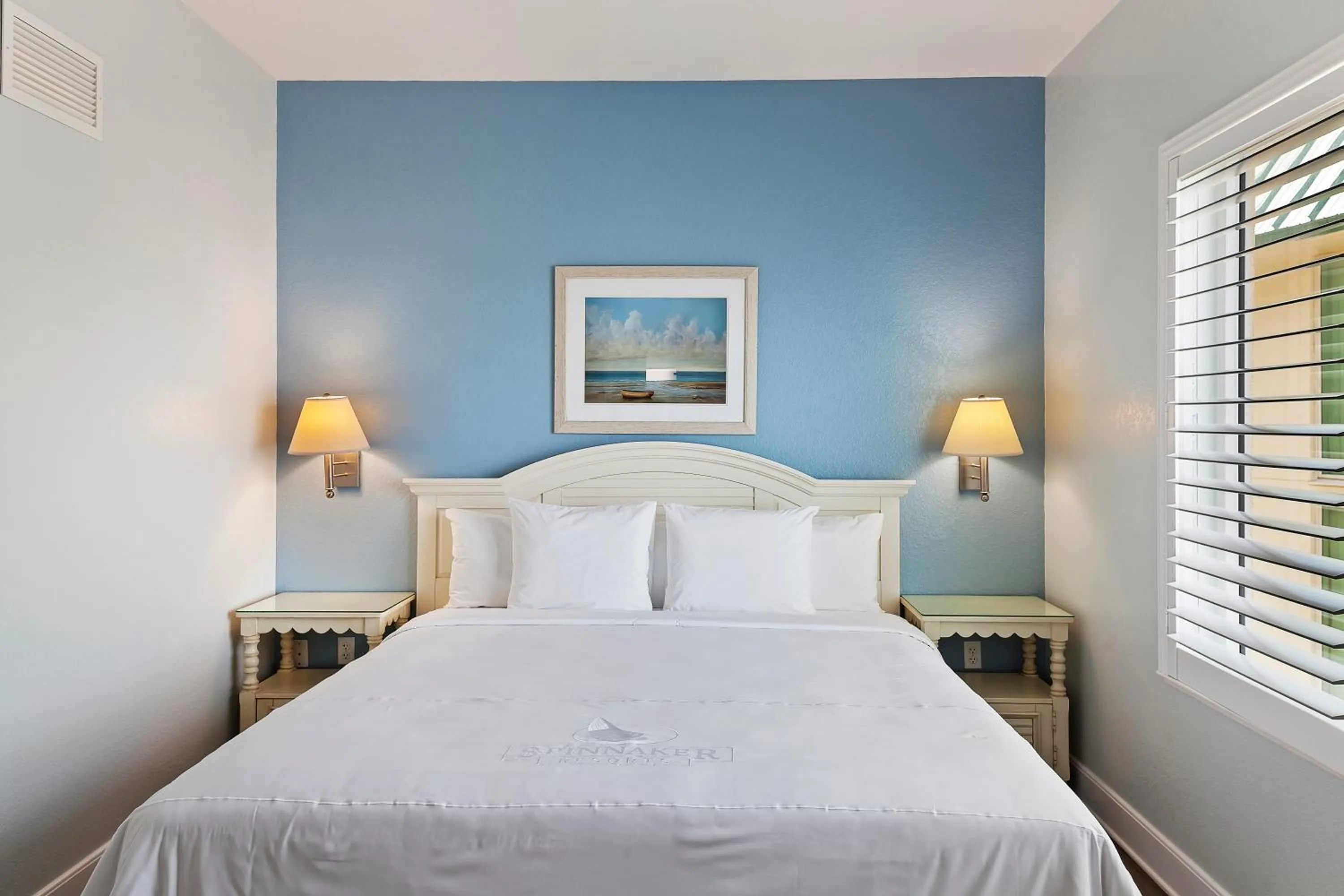 Bed in Royal Floridian Resort South by Spinnaker