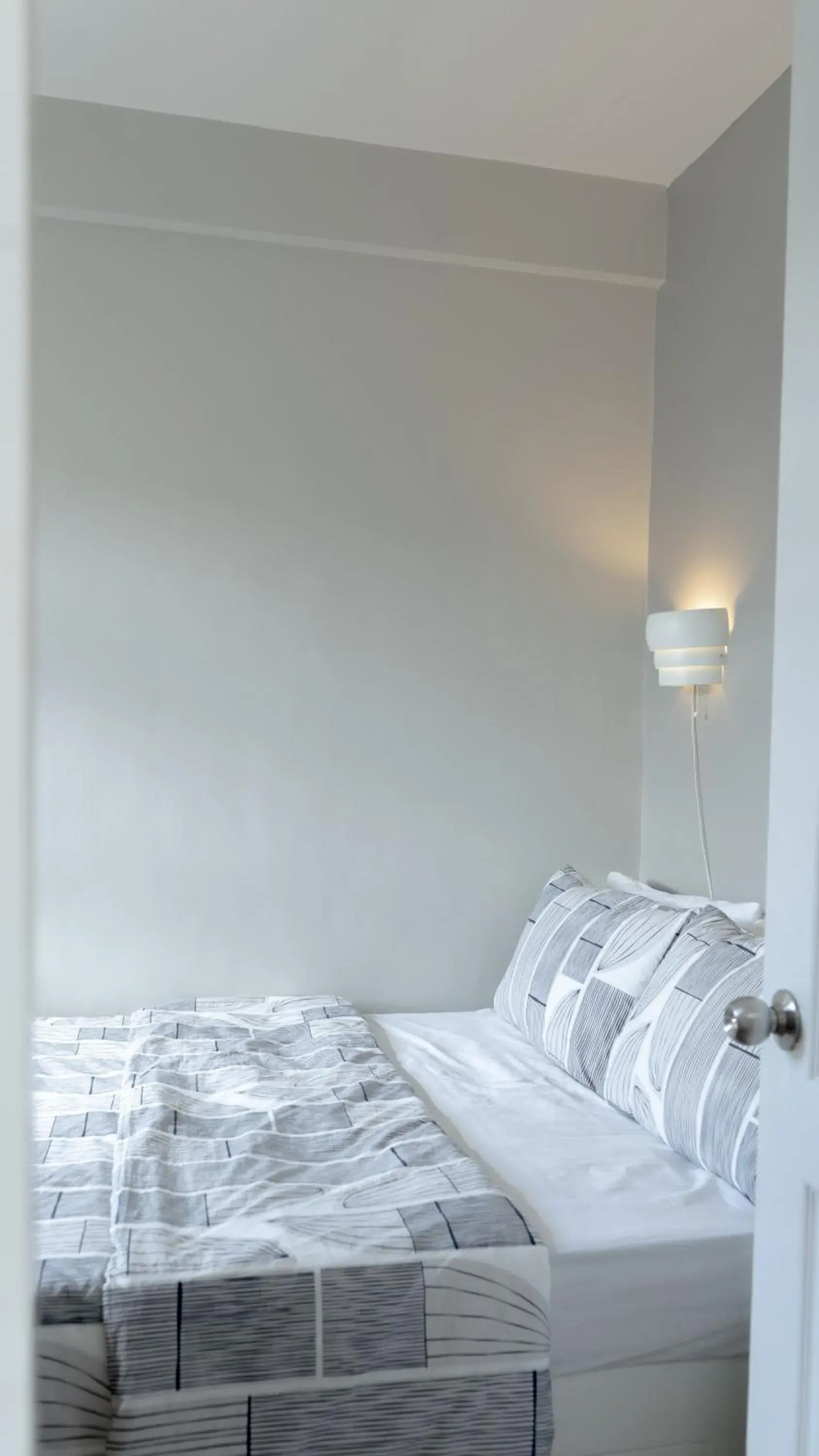 Bed in Cozy 1-bed unit near SRP Talisay Cebu Bed in Cozy 1-bed unit near SRP Talisay Cebu