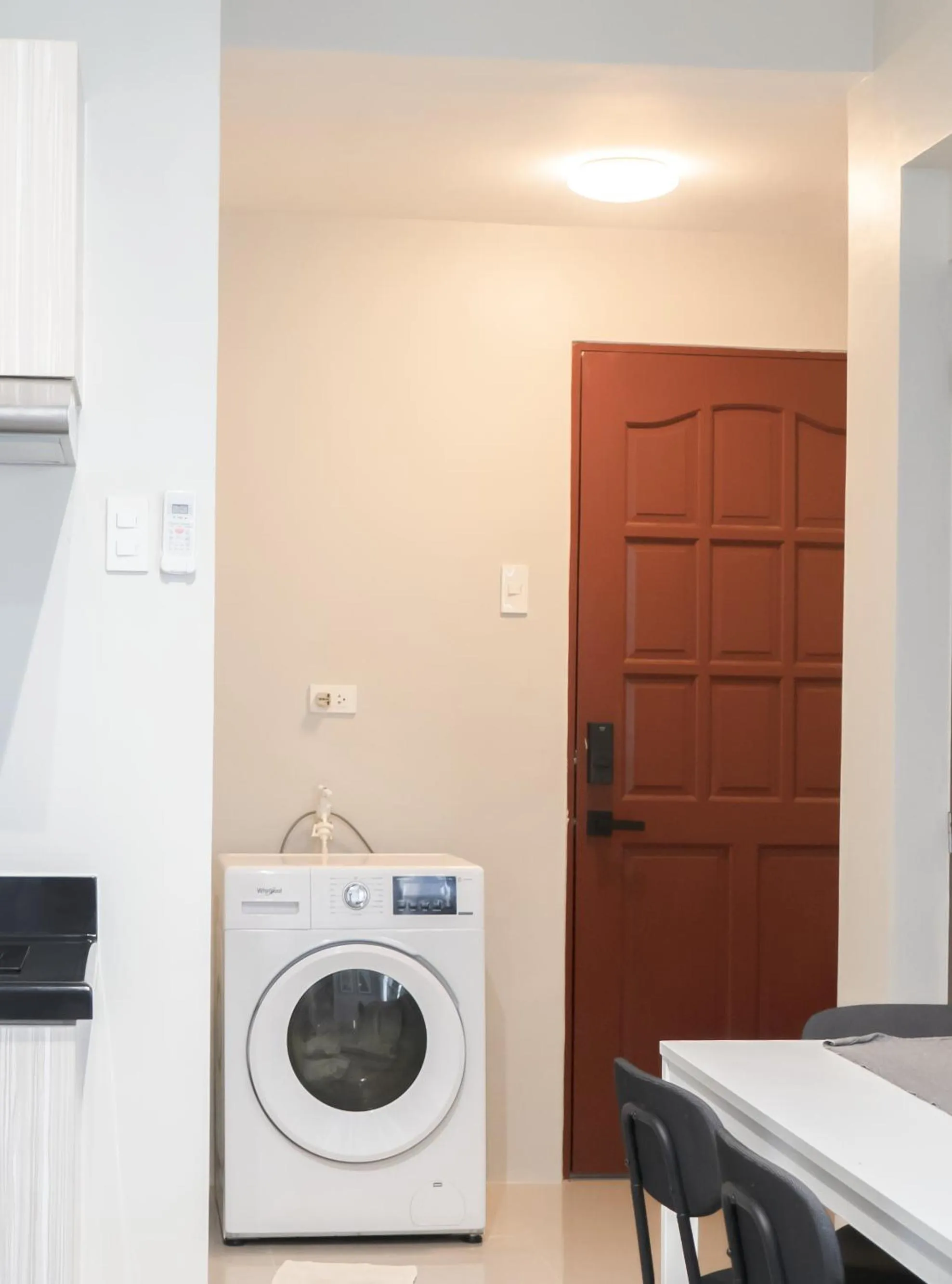 washing machine in Cozy 1-bed unit near SRP Talisay Cebu