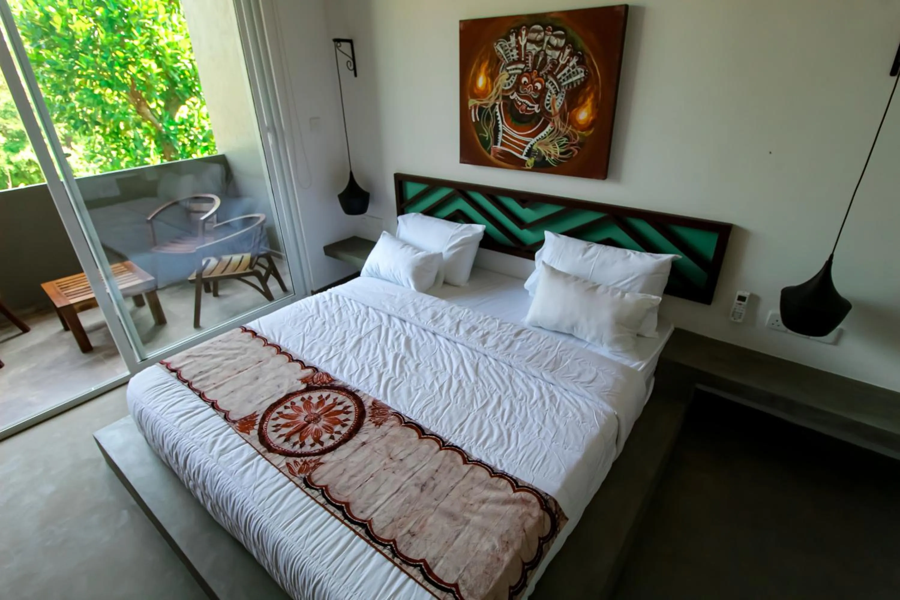 Bed in The Chariot Hikkduwa Resort