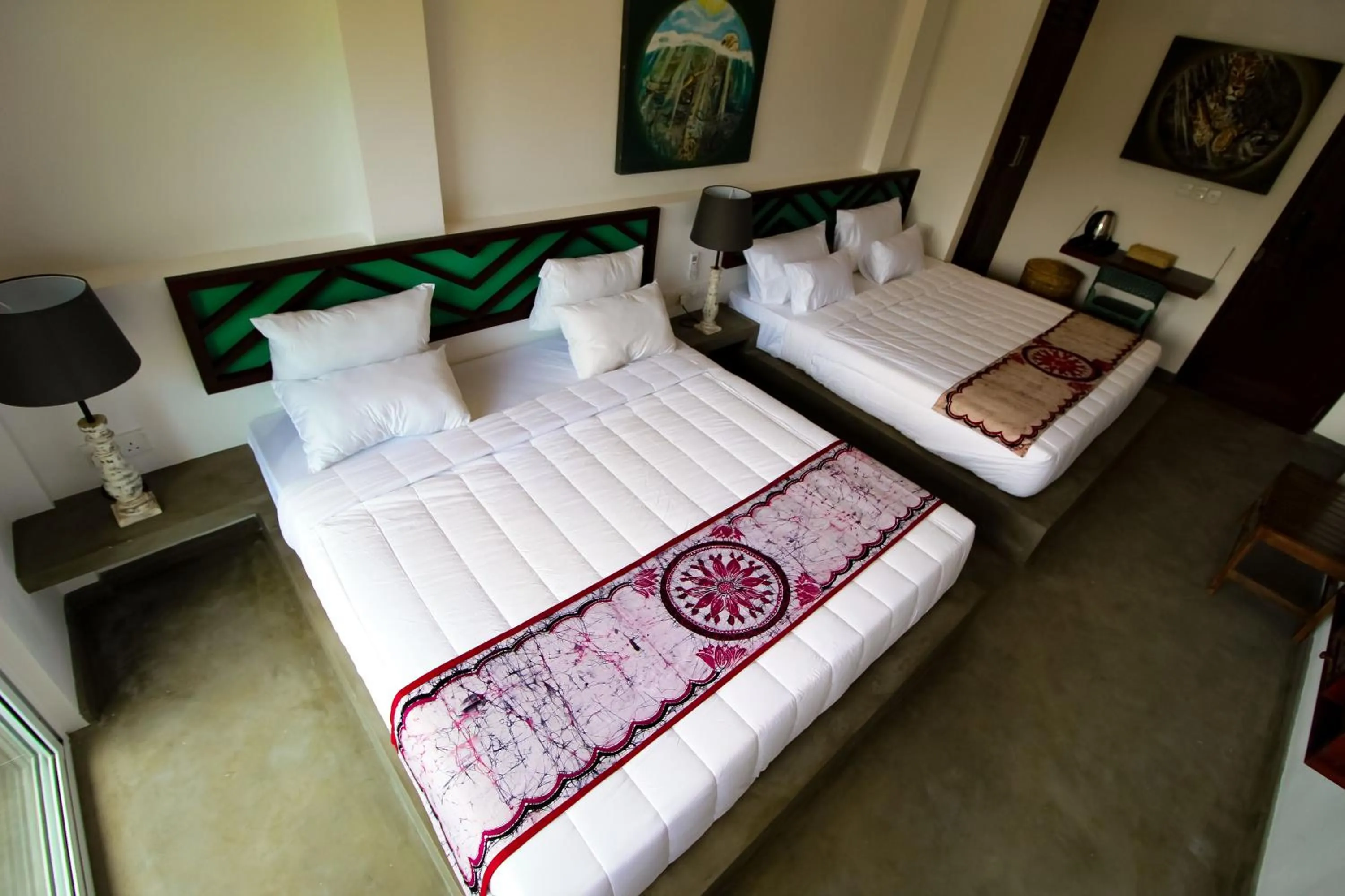 Bed in The Chariot Hikkduwa Resort