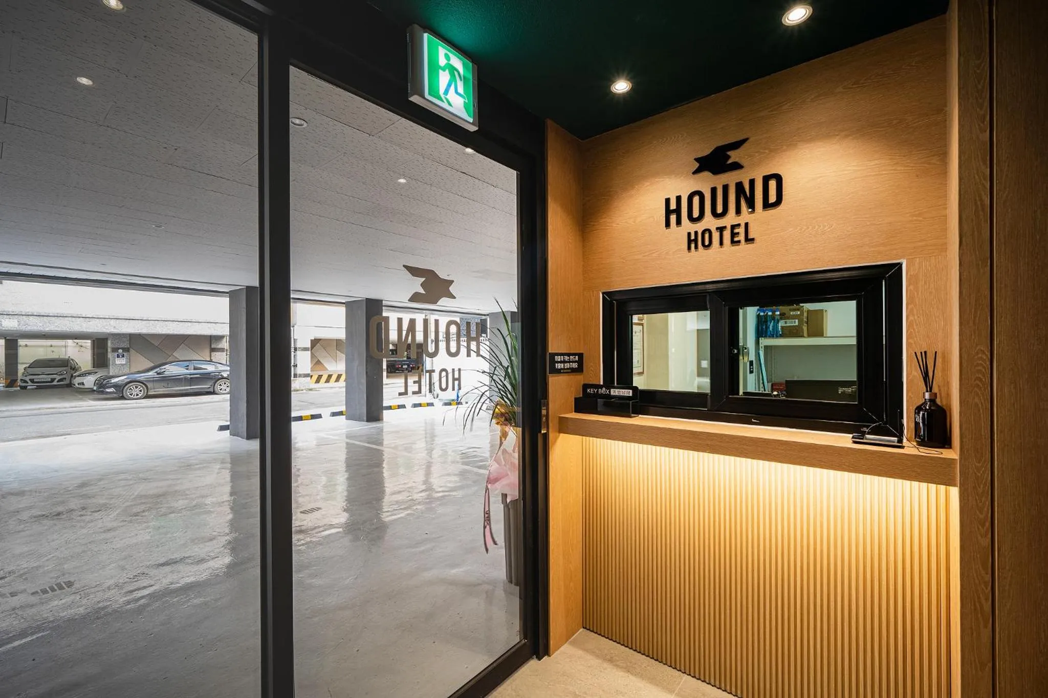 Property logo or sign in Hound Hotel Gumi indong