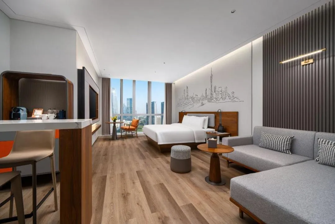 Photo of the whole room, Bed in UrCove by HYATT Guangzhou Canton Tower Exhibition CenterFree shuttle buses for the Canton Fair and the certificate - handling points for Phase 1