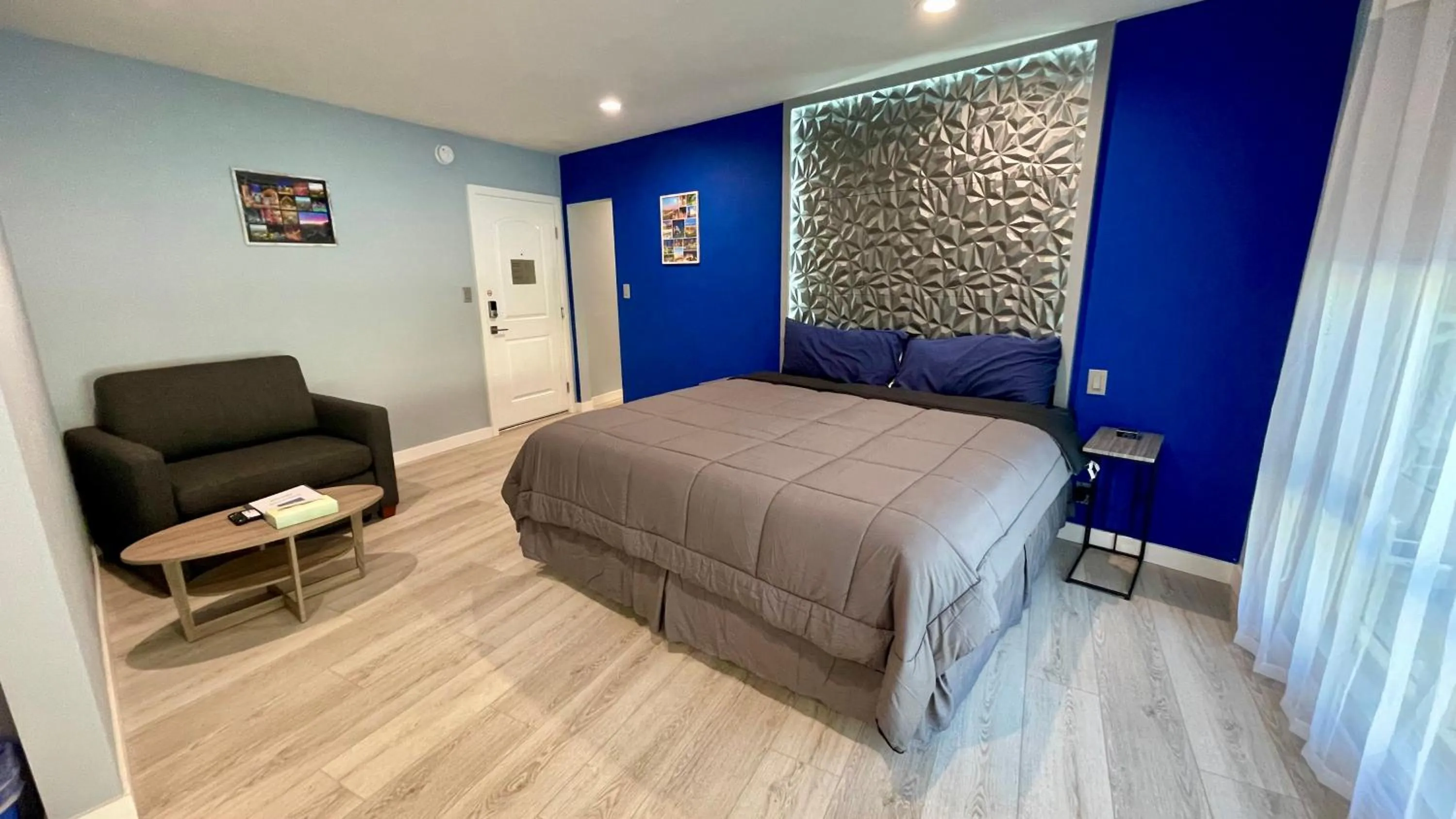 Bed in Quintessence ApartHotel